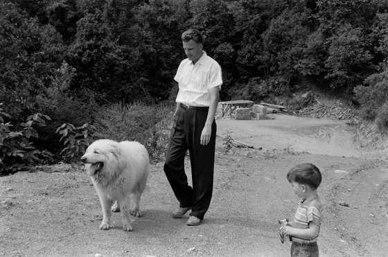 The Rev. Billy Graham with his son, Franklin, and the family dog in 1955.