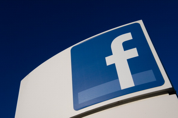 Facebook Inc. signage is displayed outside the company's campus in Menlo Park, Calif.