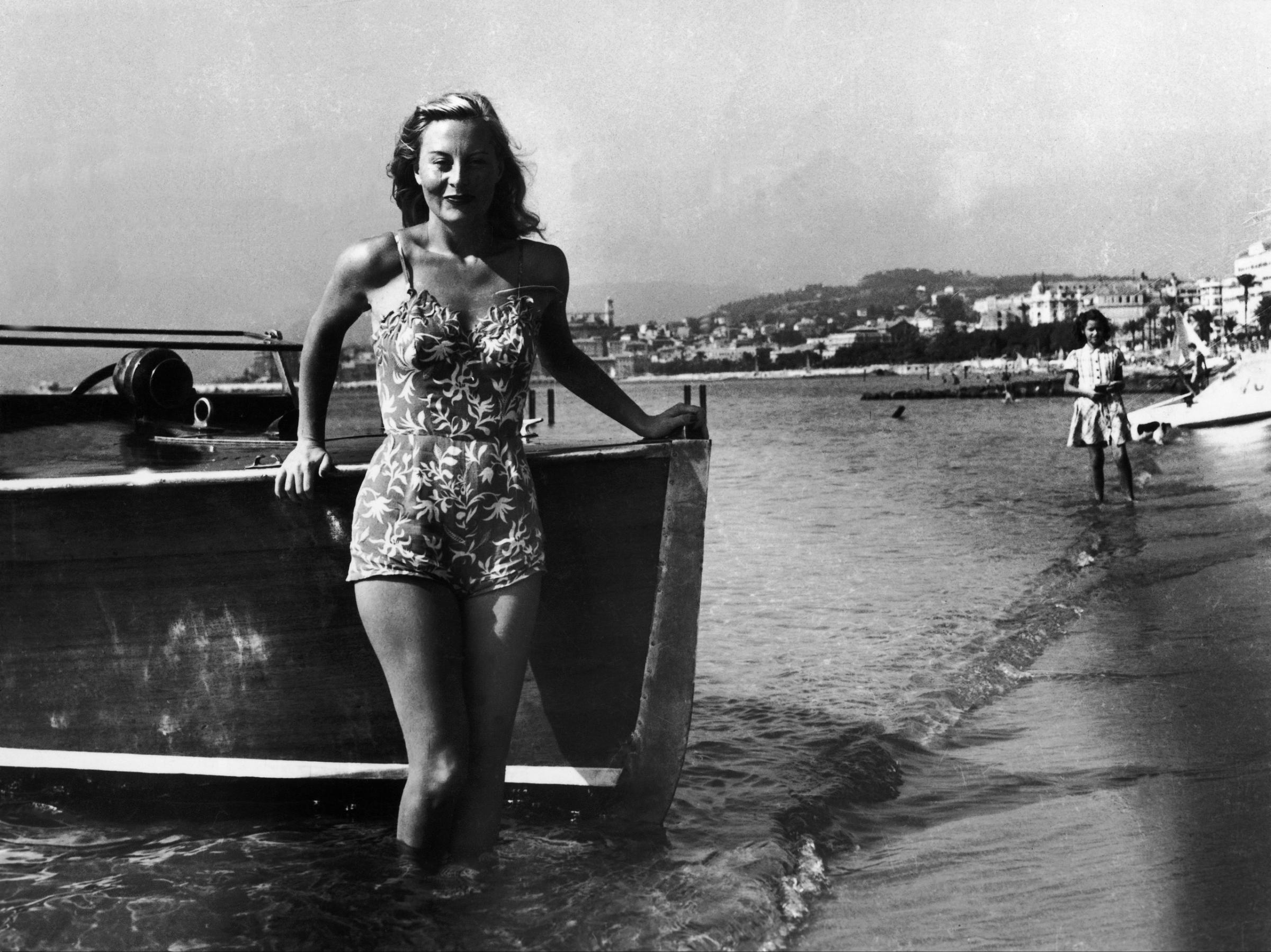 French Actress Michele Morgan poses in a bathing suit at the 1st Cannes Film Festival in Cannes, France in 1946.