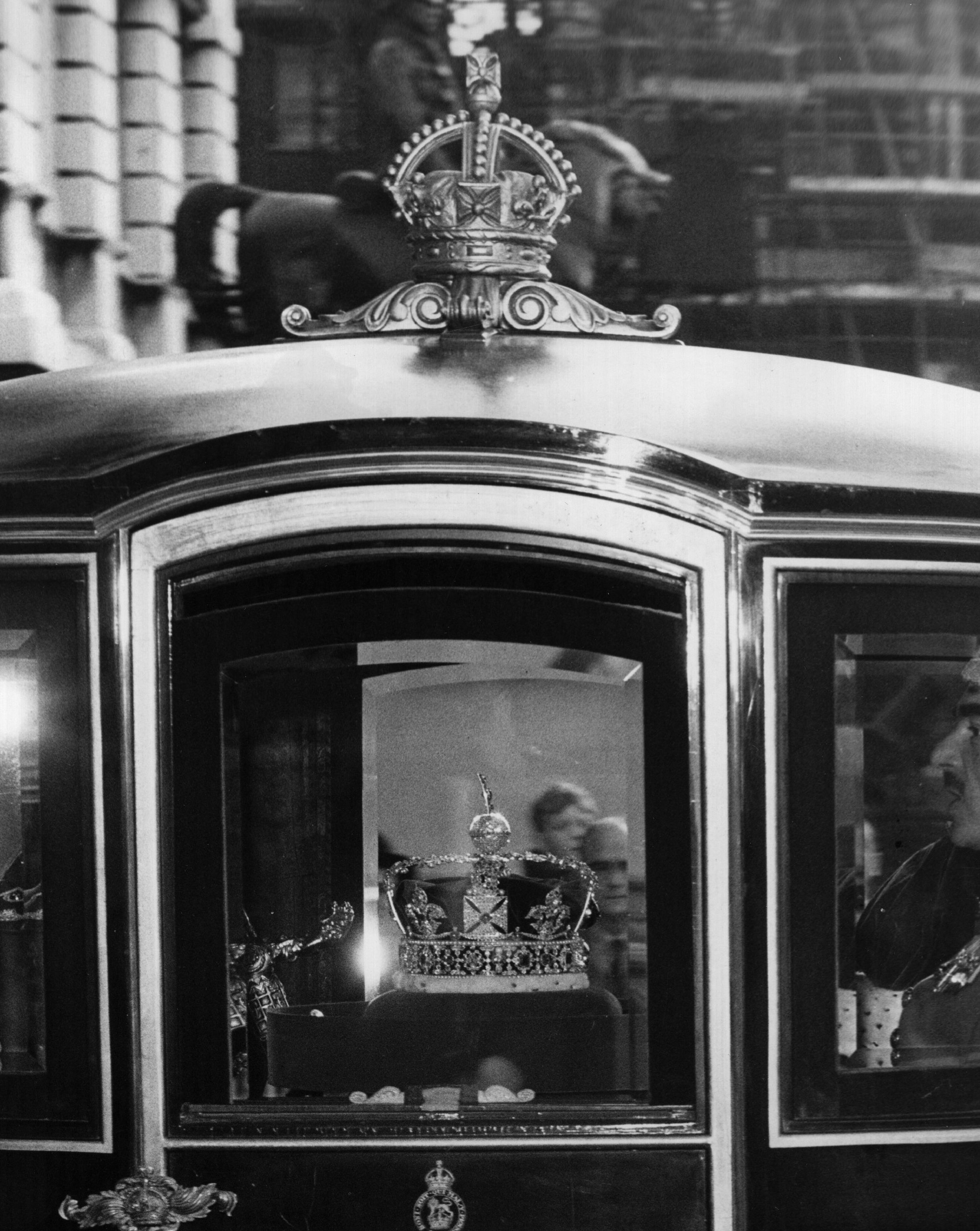The Imperial State Crown lit by special spot lights in the Queen Alexandra's State Carriage as it precedes the Queen on her way to the State Opening of Parliament, 1962.