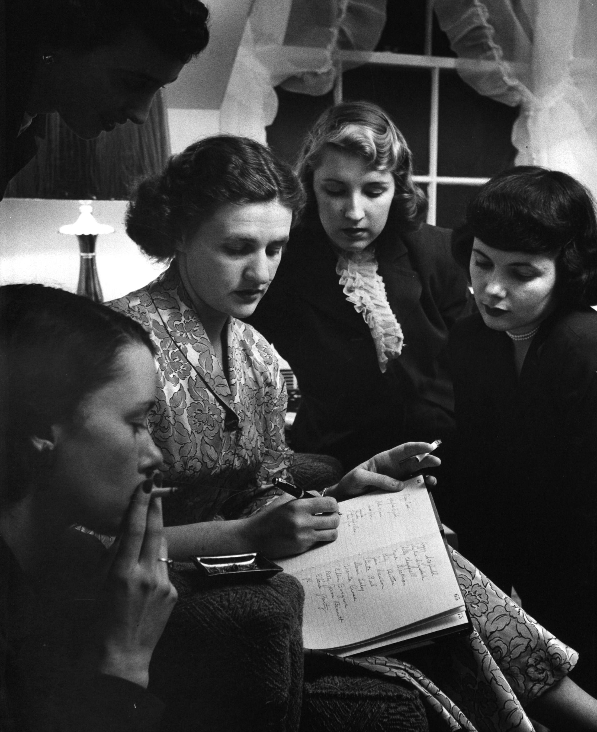 Shower guests signing a book.