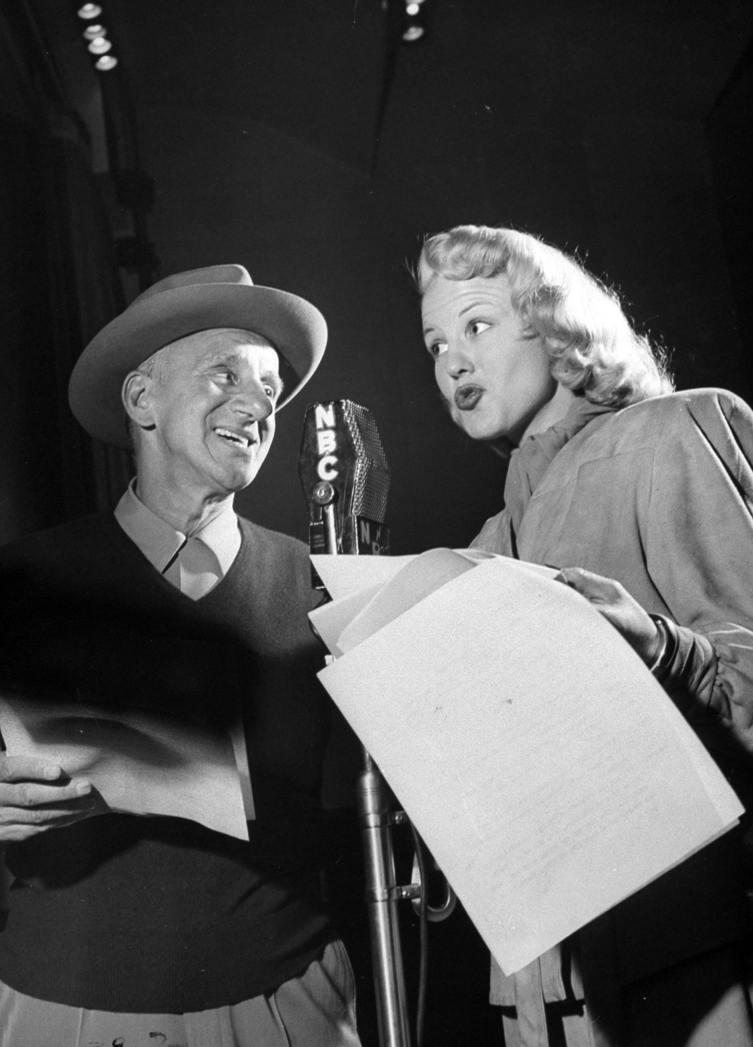 With Jimmy Durante on his radio show, Peggy Lee sings a torch ballad. Remarks Jimmy, "If I'm going to sleep, here is the girl I'll dream about."