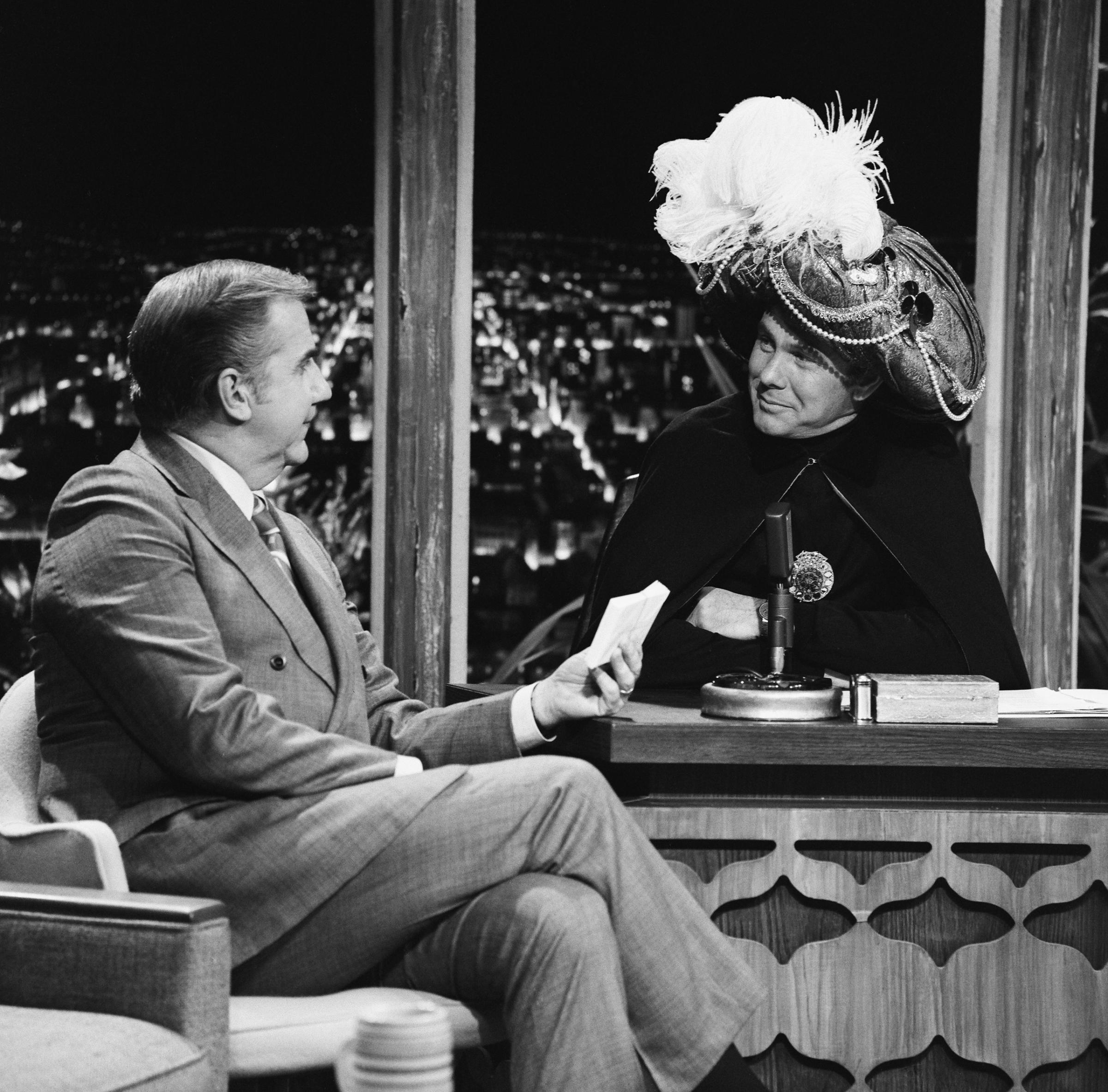 The Tonight Show starring Johnny Carson: (l-r) Announcer Ed McMahon and host Johnny Carson as Carnac the Magnificent on November 17, 1970.