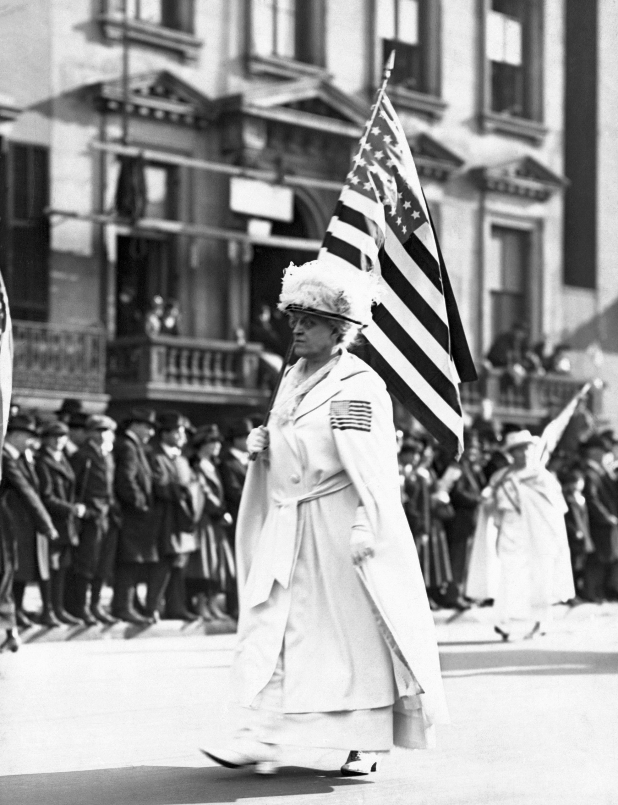 Carrie Chapman Catt (1849-1947), Suffragette taking part in New York parade.