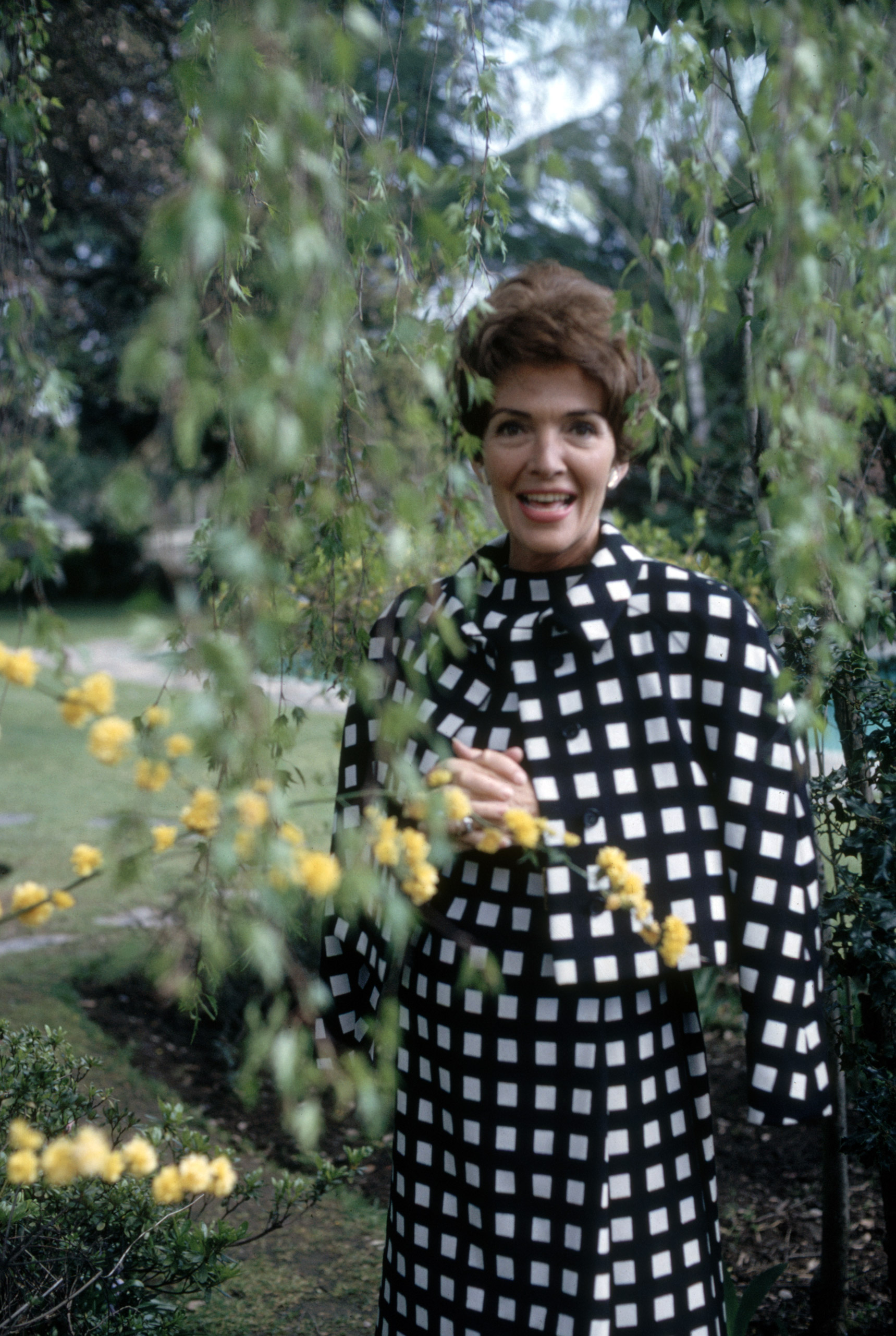 Nancy Reagan wearing a patterned dress from designer Galanos, 1967.