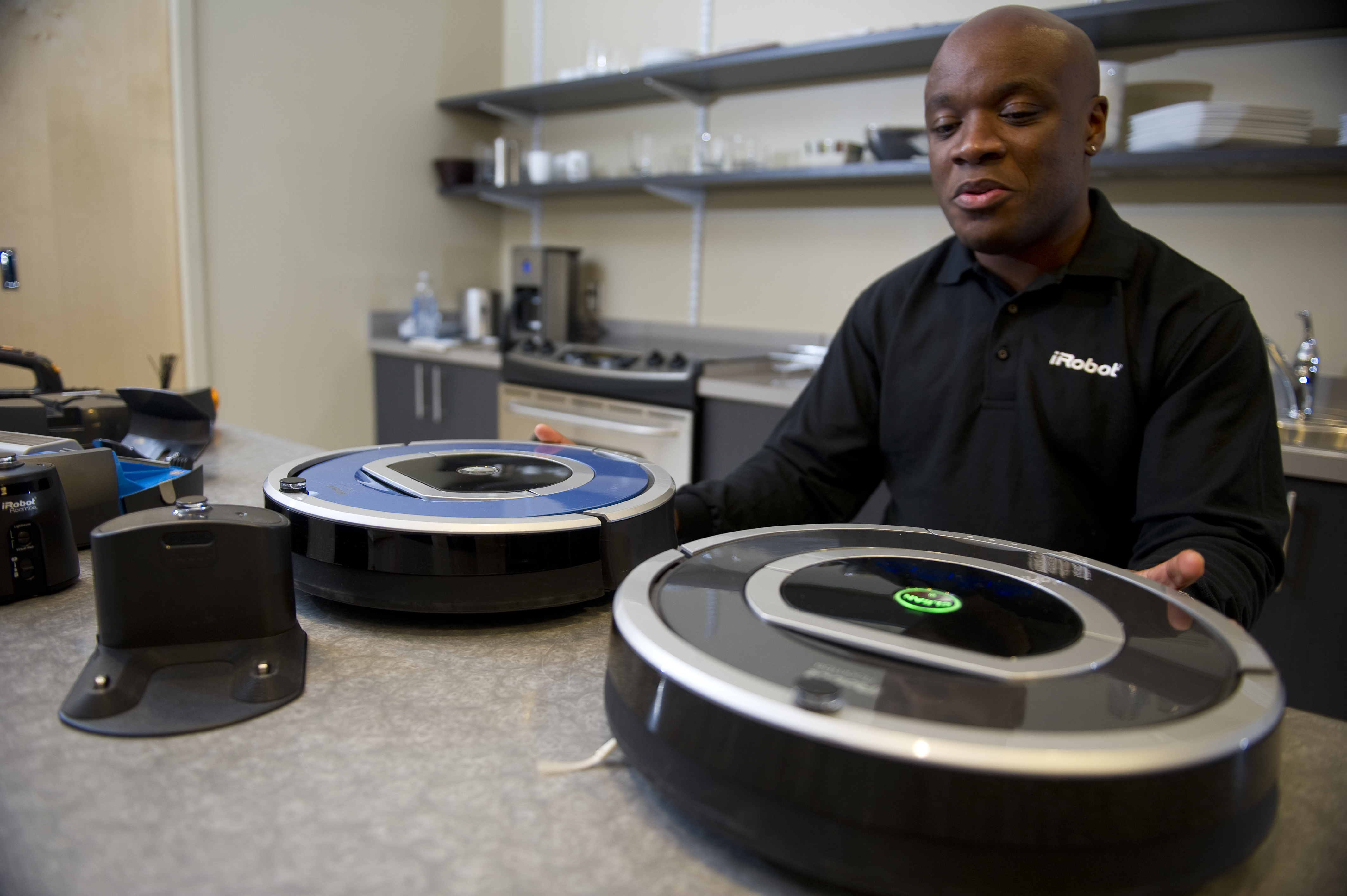 The features of the iRobot Roomba are demonstrated by an iRobot employee in a show room at the iRobot offices, on August 24, 2012 in Bedford, Massachusetts. (Christian Science Monitor&mdash;Christian Science Monitor/Getty)