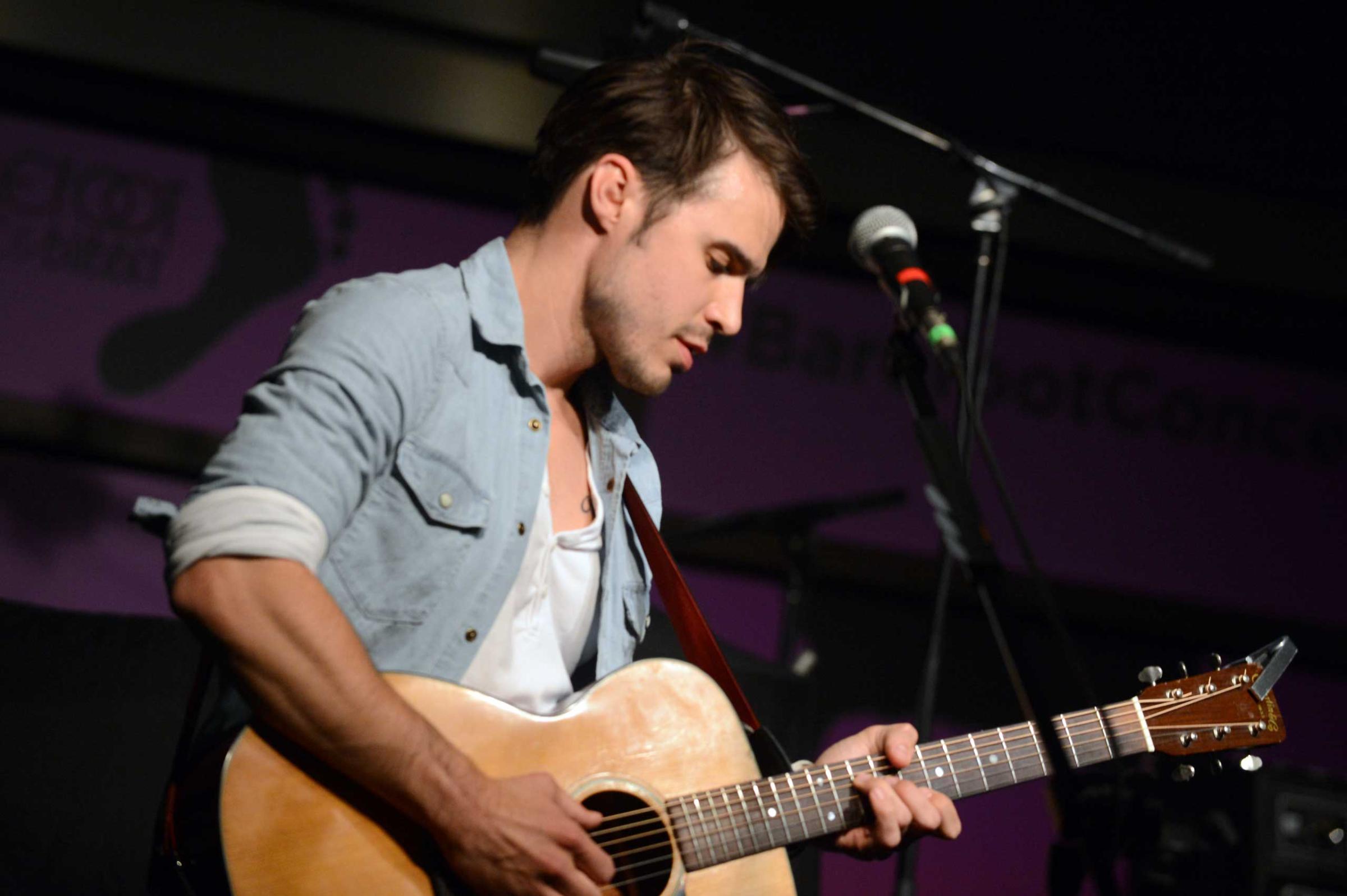 Kris Allen performs at the Soles4Souls charity concert, sponsored by Barefoot Wine & Bubbly at the Bridge Building in Nashville on April 1, 2014.