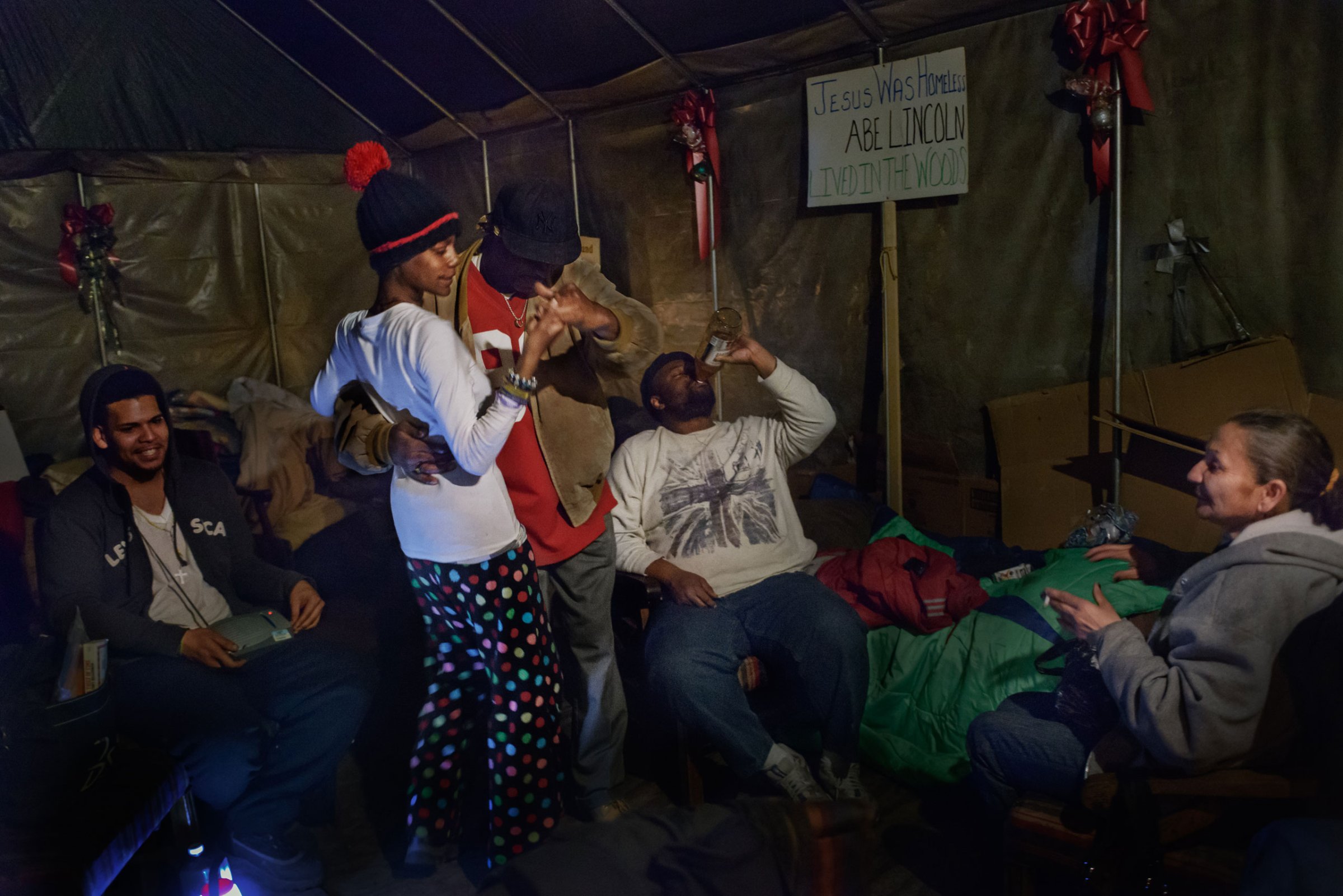 8 March  2014 - Tent City, Lakewood, New Jersey - Inside Tent City's chapel, "Uncle Mike"  dances salsa with Eve.