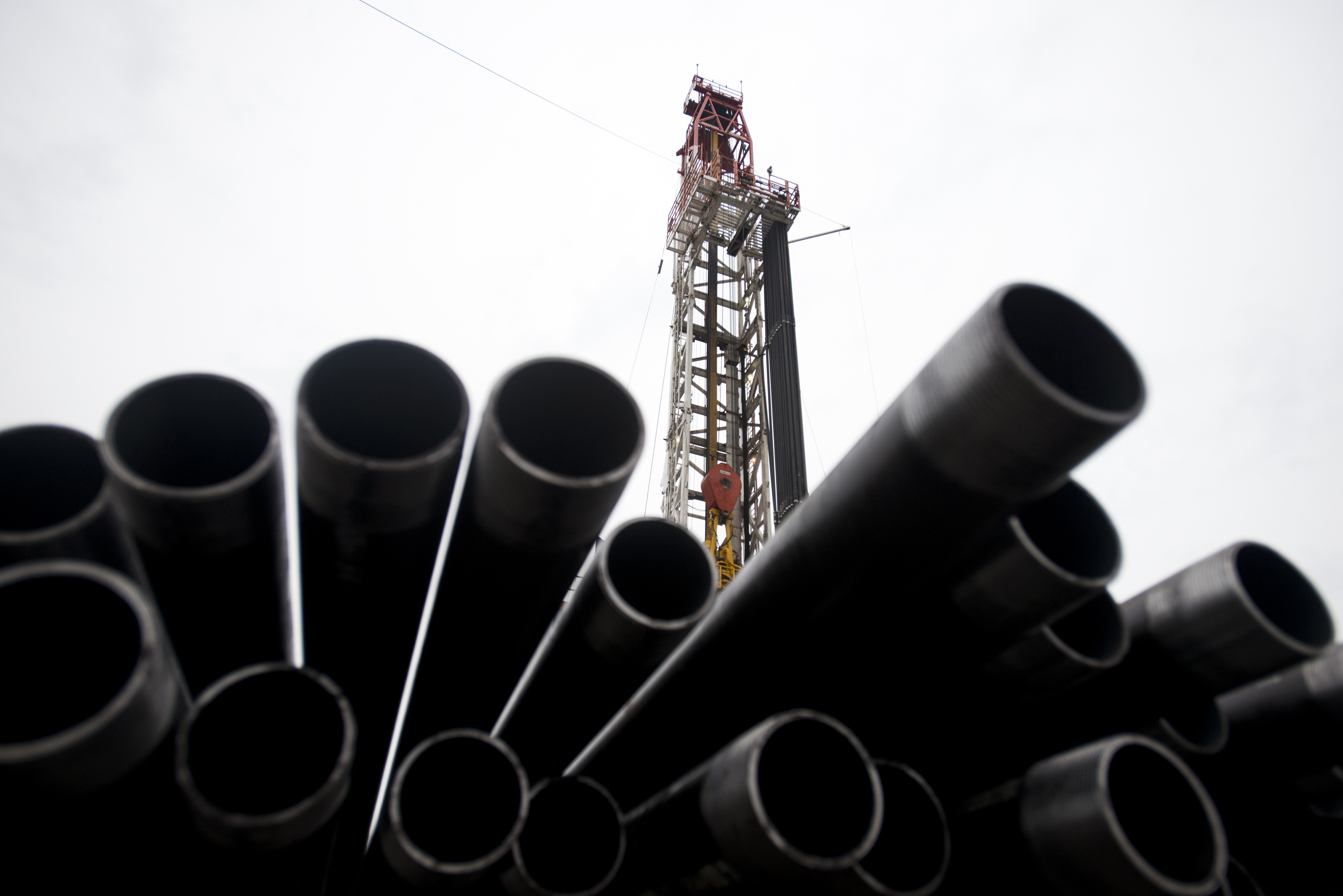 Threaded drilling pipes are stacked at a hydraulic fracturing site owned by EQT Corp. located atop the Marcellus shale rock formation in Washington Township, Penn., U.S., on Oct. 31, 2013. (Ty Wright—Bloomberg/Getty Images)