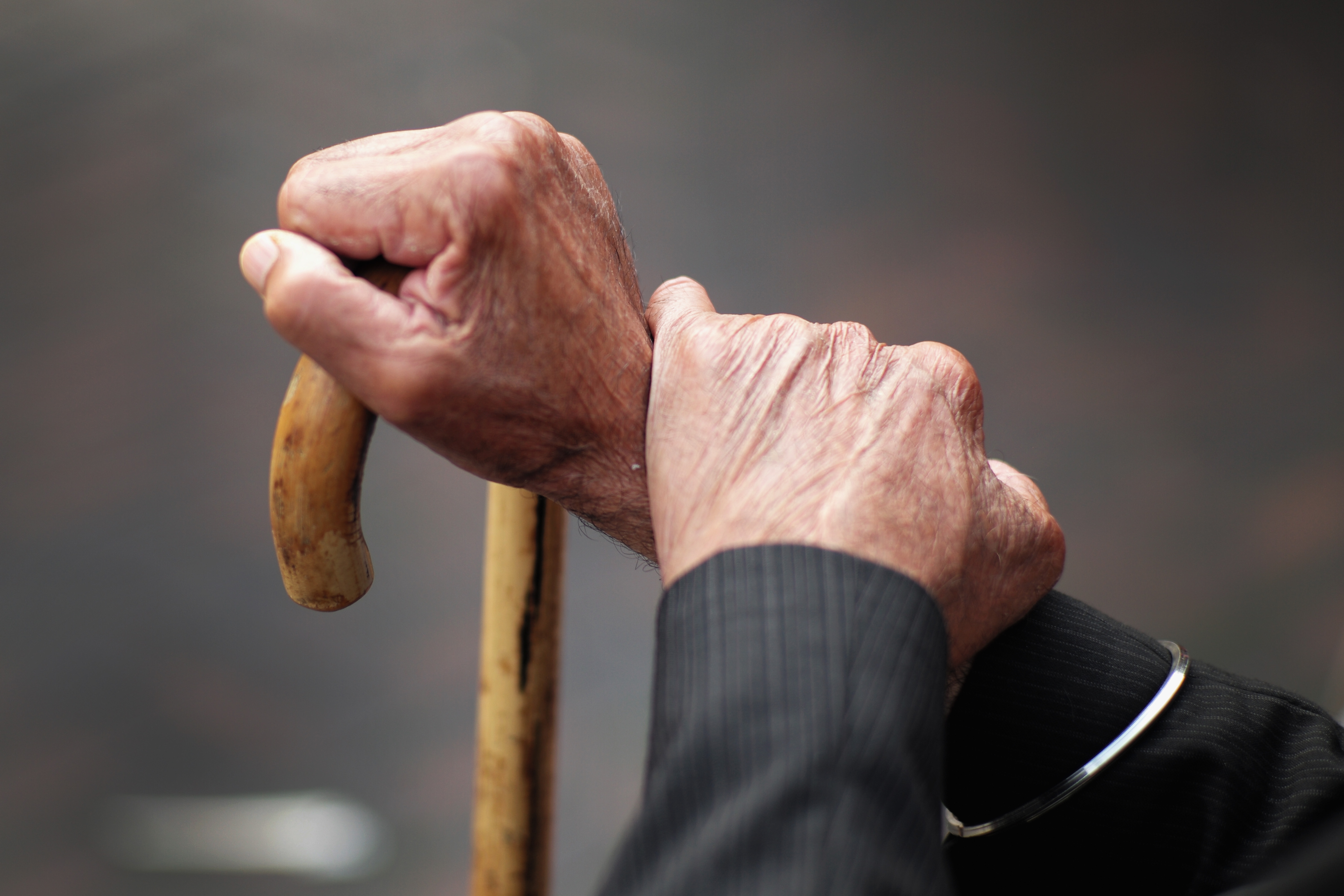 A pensioner holds his walking stick on September 8, 2014 in Walsall, England. (Christopher Furlong—Getty Images)