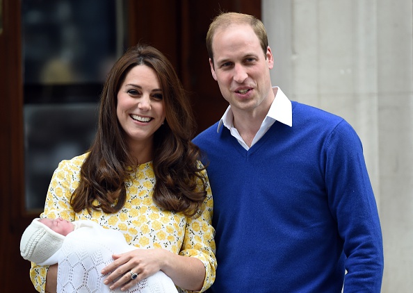 Catherine Duchess of Cambridge, wearing a Jenny Packham dress, and Prince William, Duke of Cambridge leave the Lindo Wing at St. Mary's Hospital  with their new born baby daughter on May 02, 2015 in London, England.  The Duchess of Cambridge safely delivered a daughter at 8:34am this morning weighing 8lbs 3oz. (Anwar Hussein/WireImage—Getty Images)