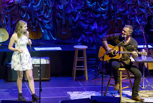 Cali Hetfield (L) and James Hetfield perform during the 2nd Annual "Acoustic-4-A-Cure" Benefit Concert in San Francisco on May 15, 2015.