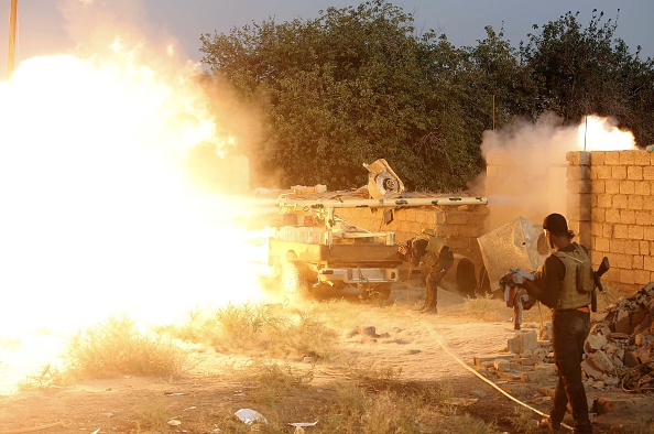 Iraqi Shiite fighters battle Sunni Islamic State militants north of Baghdad May 26. (MOHAMMED SAWAF / AFP / Getty Images)