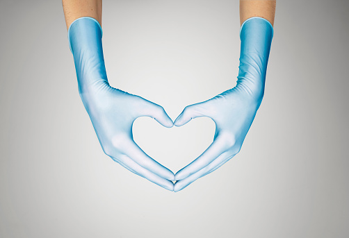 gloved-hands-heart-shape
