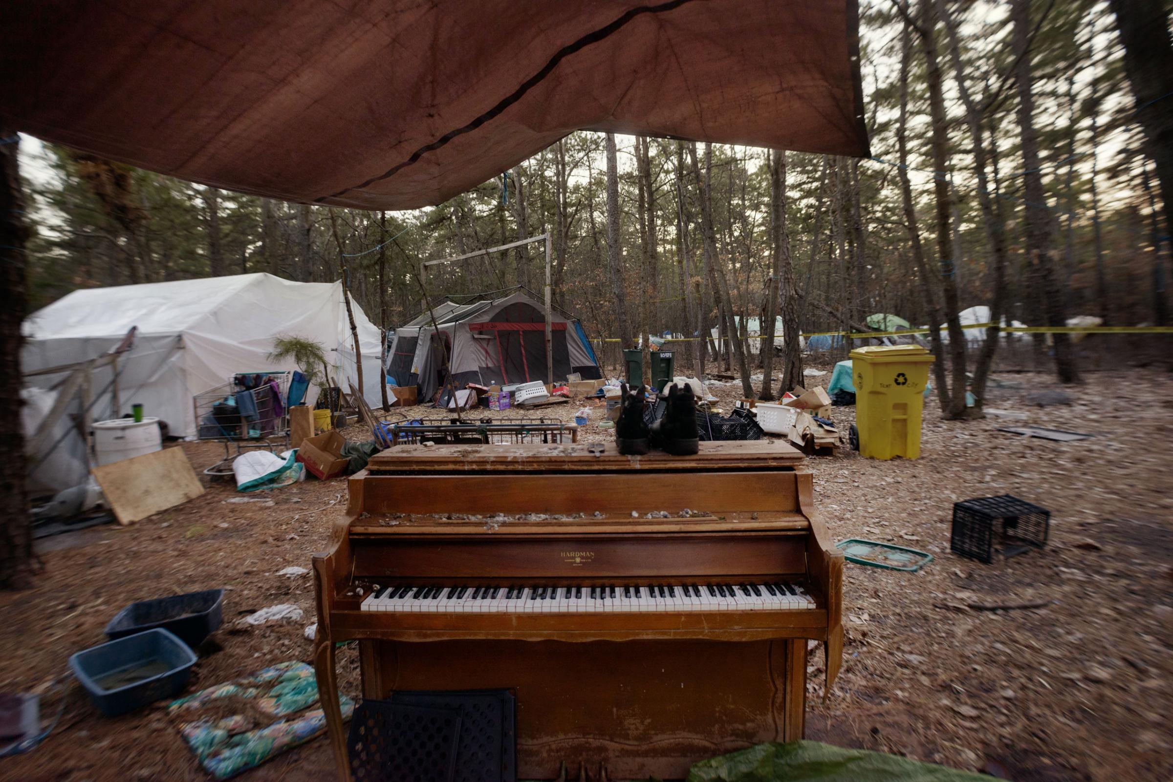 20  March  2014 - Tent City, Lakewood, New Jersey - A piano in a makeshift courtyard.