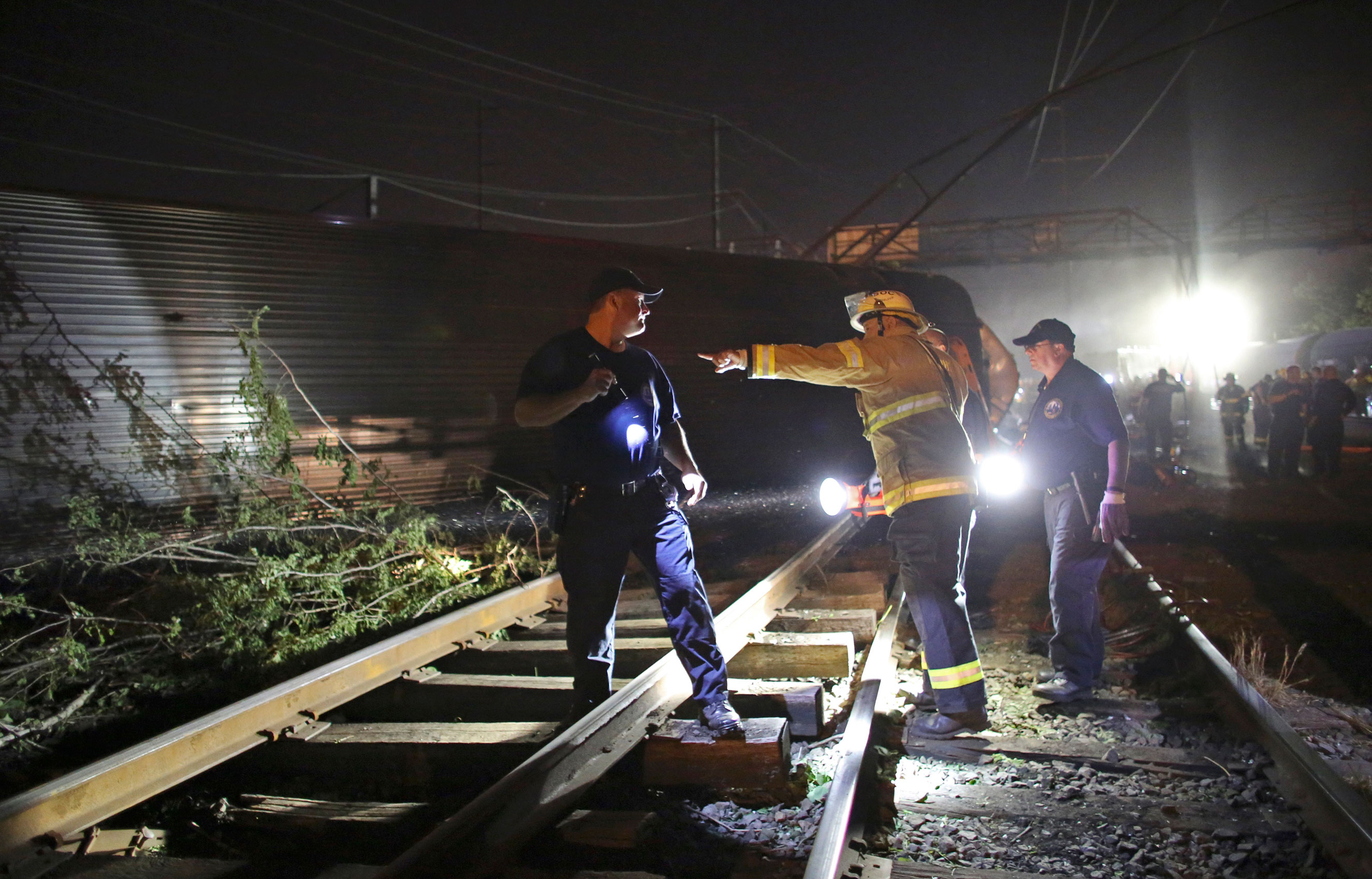 Emergency personnel work the scene of the Amtrak train wreck on May 12, 2015 in Philadelphia.