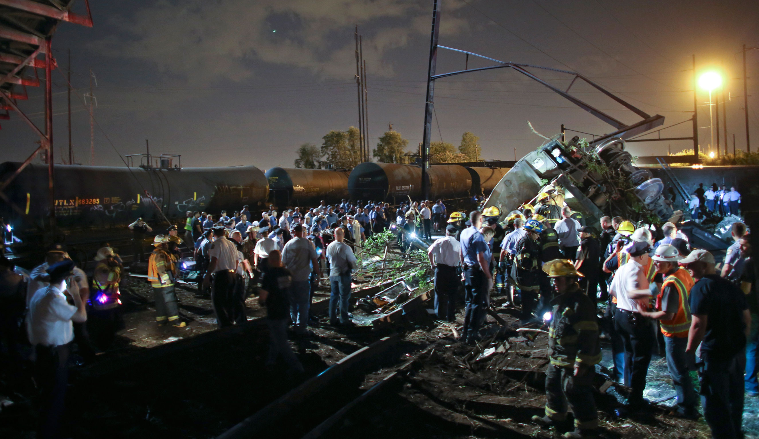 Emergency personnel work the scene of the Amtrak train wreck on May 12, 2015 in Philadelphia.