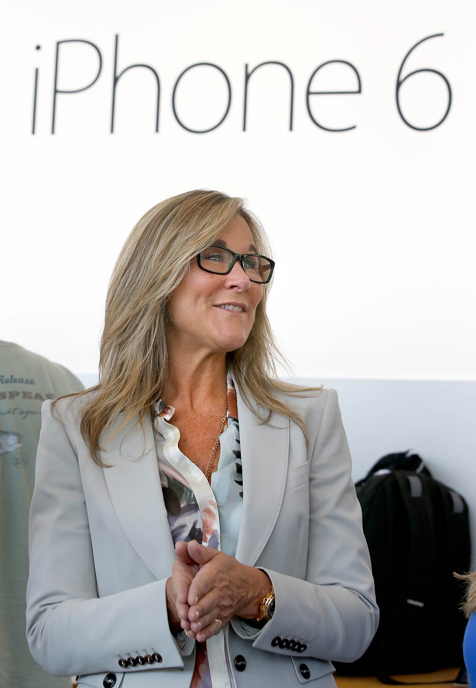 Angela Ahrendts, senior vice president of retail and online stores at Apple Inc., walks through the Apple Store during the launch and sale of the new iPhone 6 on Sept 19, 2014, in Palo Alto, Calif. (Tony Avelar—AP)