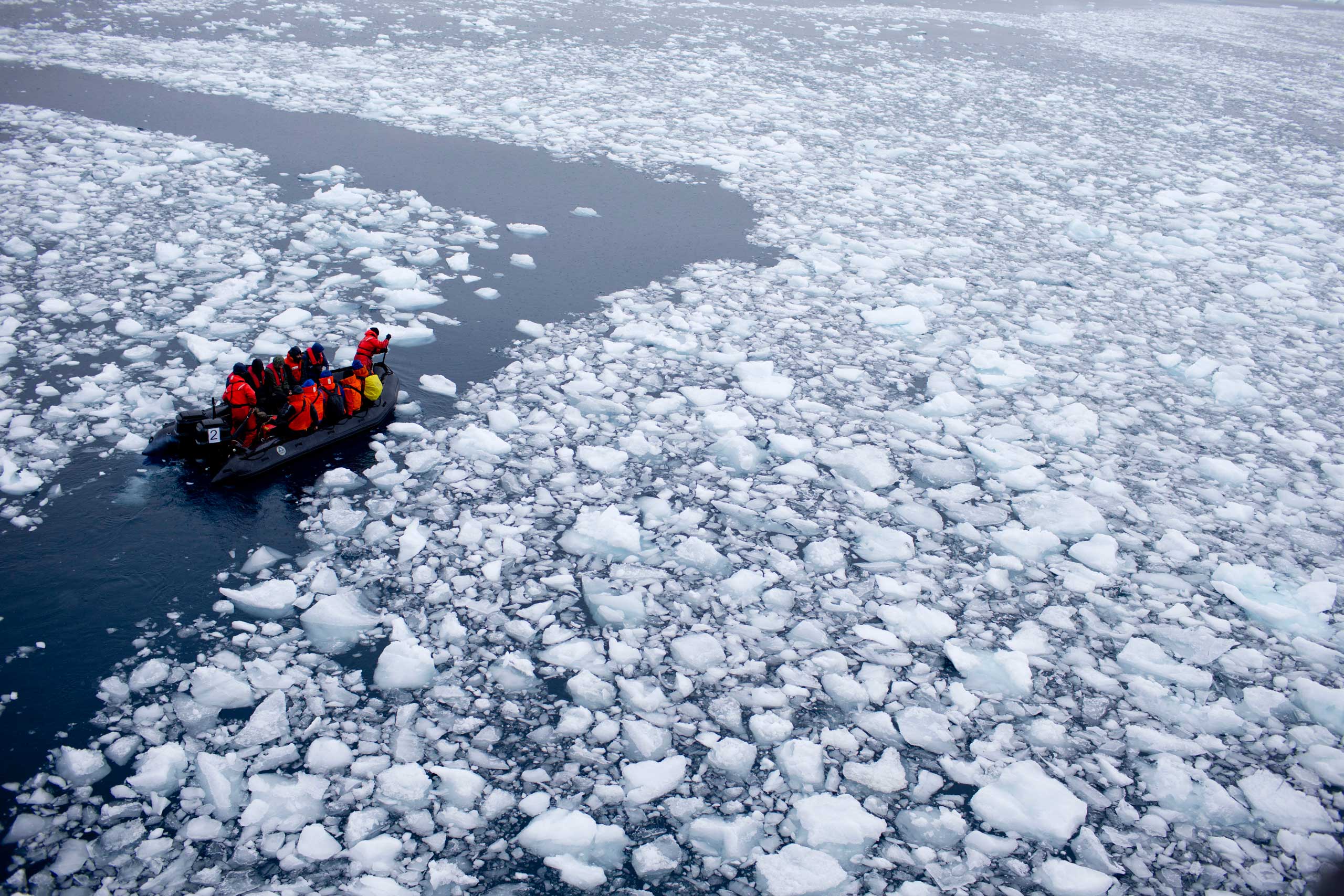 A team of international scientists heads to Chile's station Bernardo O'Higgins, Antarctica on Jan. 22, 2015. Water is eating away at the Antarctic ice, melting it where it hits the oceans. As the ice sheets slowly thaw, water pours into the sea, 130 billion tons of ice (118 billion metric tons) per year for the past decade, according to NASA satellite calculations. (AP Photo/Natacha Pisarenko)