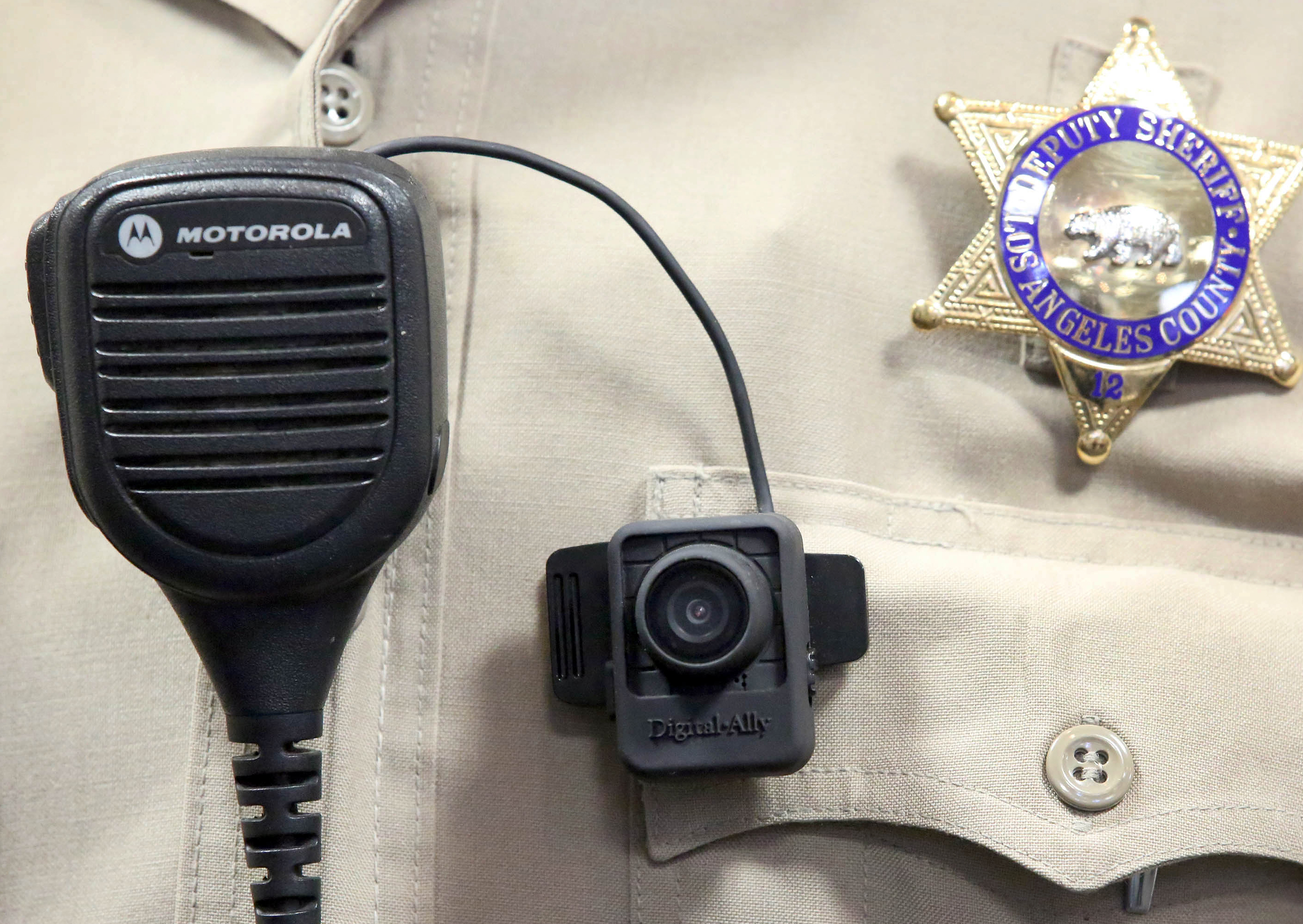A body camera is displayed at a news conference at the Sheriff's Headquarters in the Monterey Park section of Los Angeles on Sept. 22, 2014. (Nick Ut—AP)