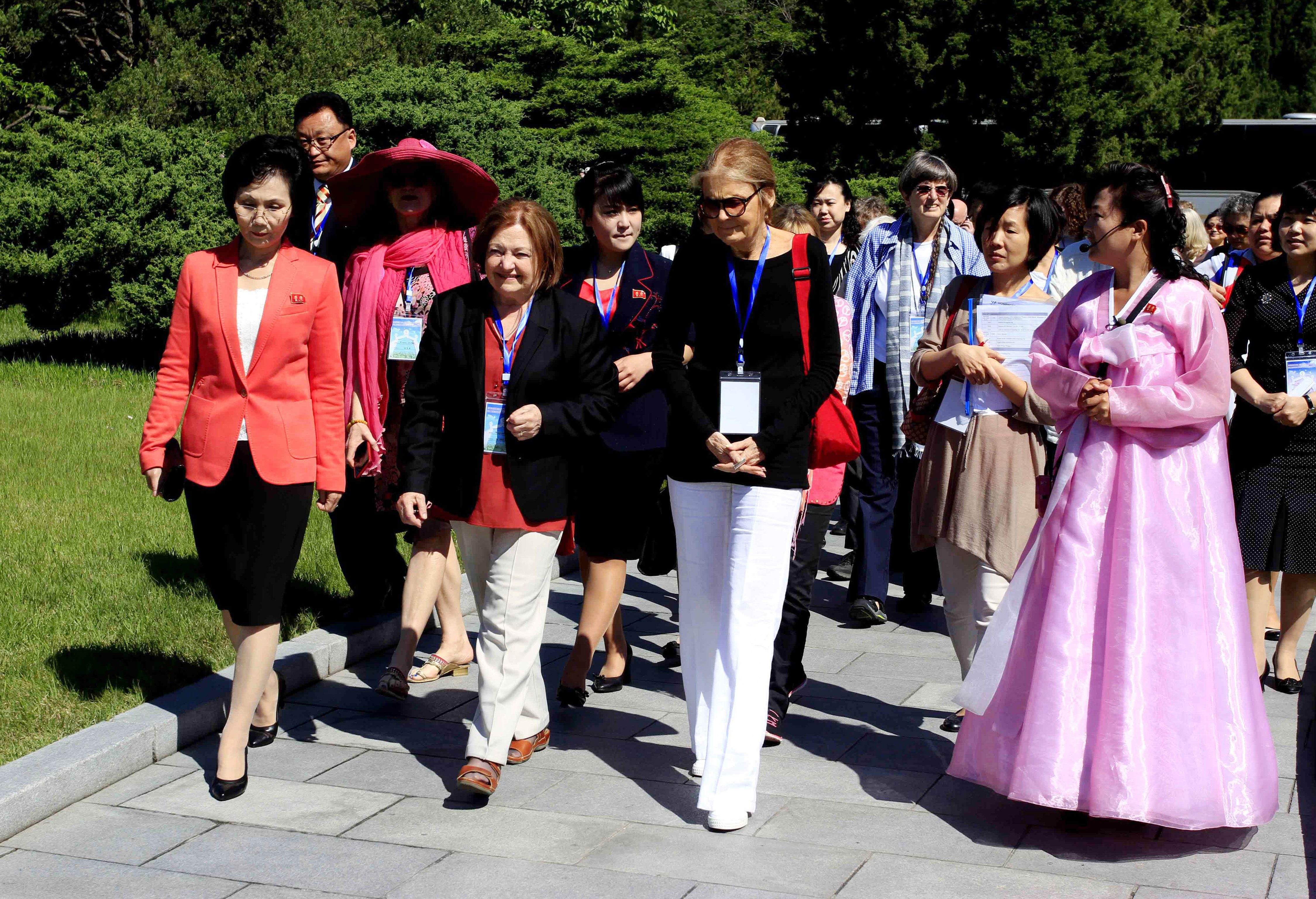 Activist Gloria Steinem, center right, and Nobel Peace Prize laureate Mairead Maguire, center left, along with other delegation, visit Mangyongdae, the birthplace of North Korea's late leader Kim Il Sung, in Pyongyang, Wednesday, May 20, 2015
