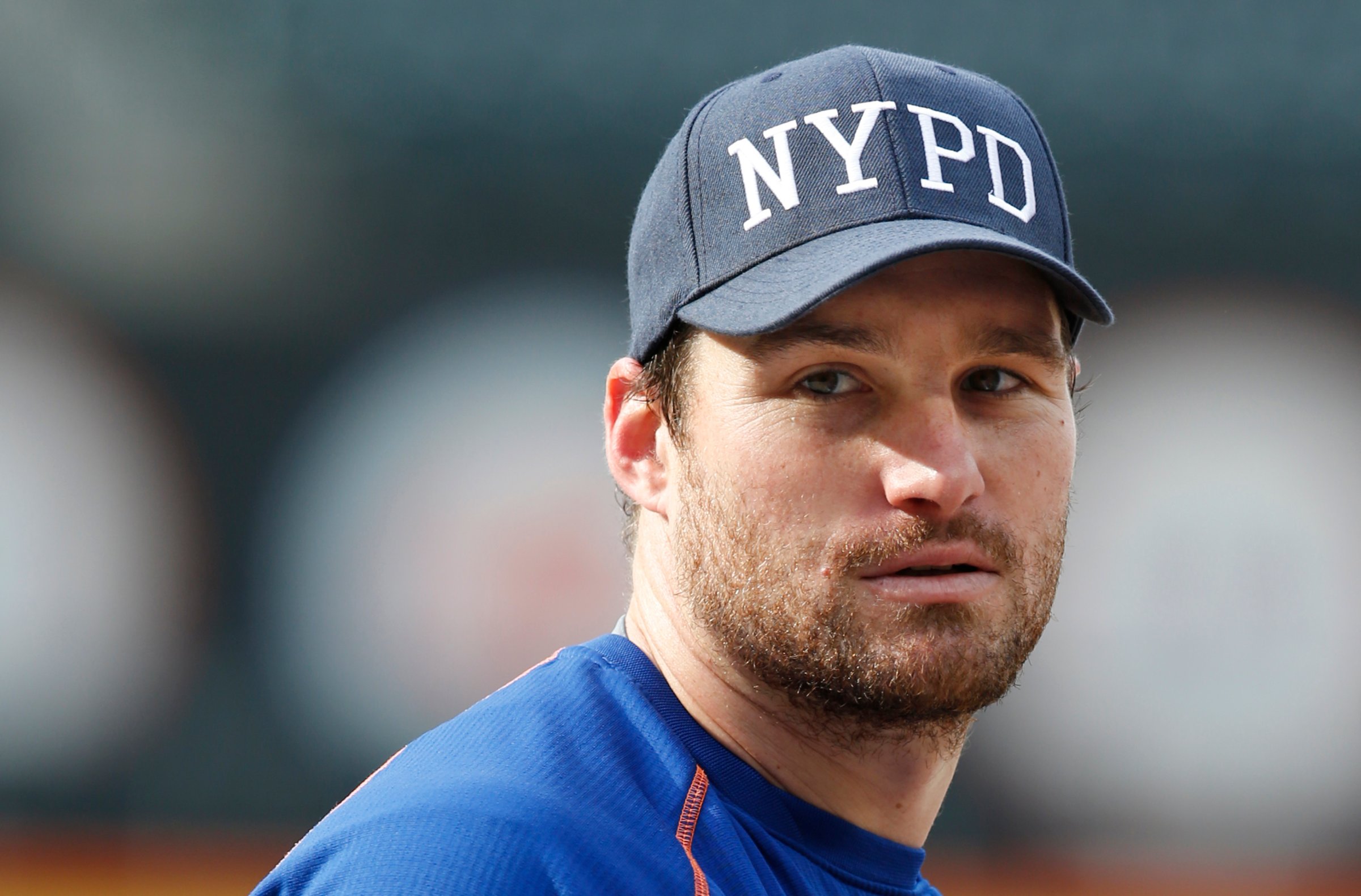 New York Mets Daniel Murphy wears a New York Police Department hat, May 5, 2015