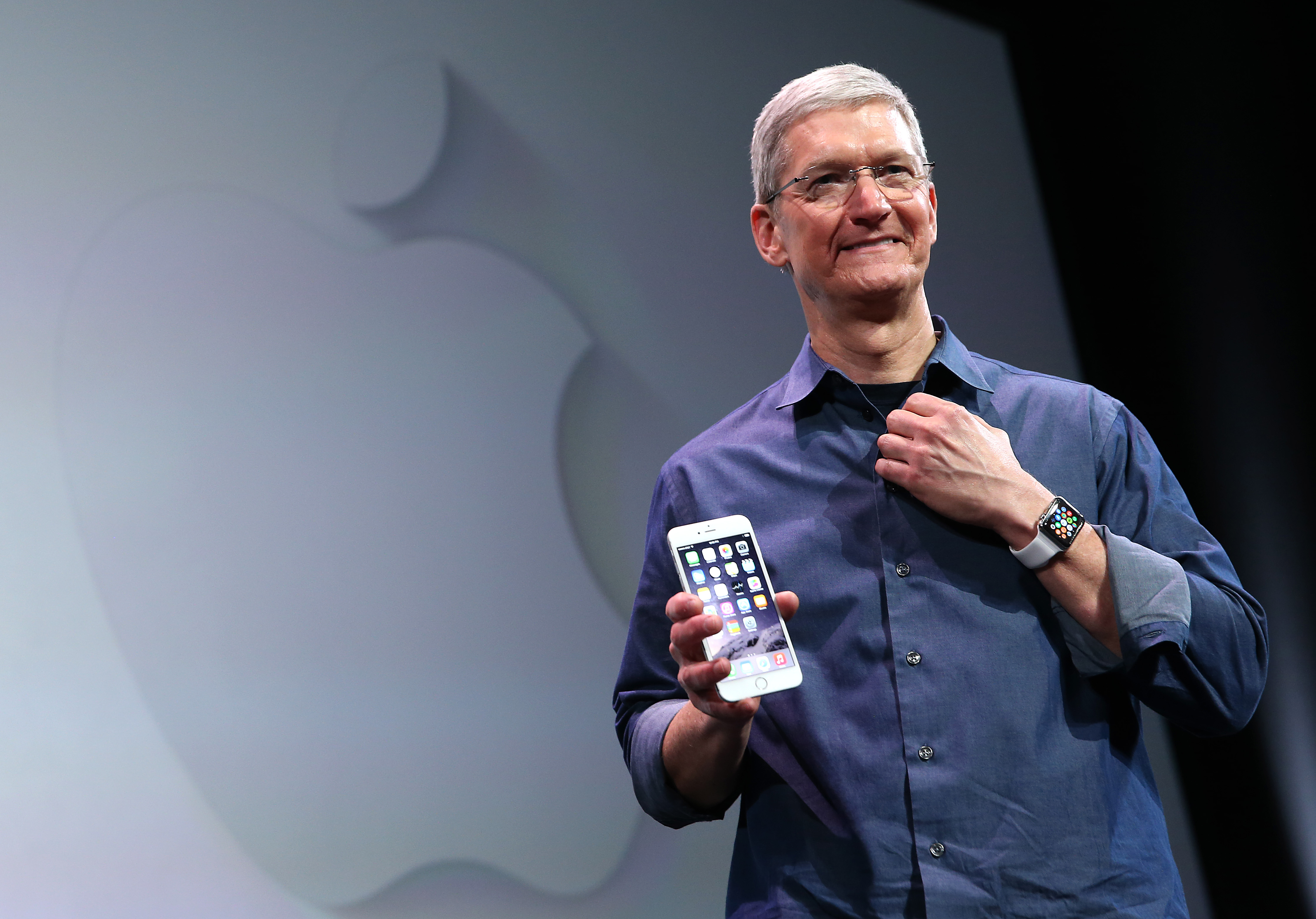 Apple CEO Tim Cook shows off the new iPhone 6 and the Apple Watch during an Apple special event at the Flint Center for the Performing Arts on Sept. 9, 2014 in Cupertino, Calif. (Justin Sullivan&mdash;Getty Images)