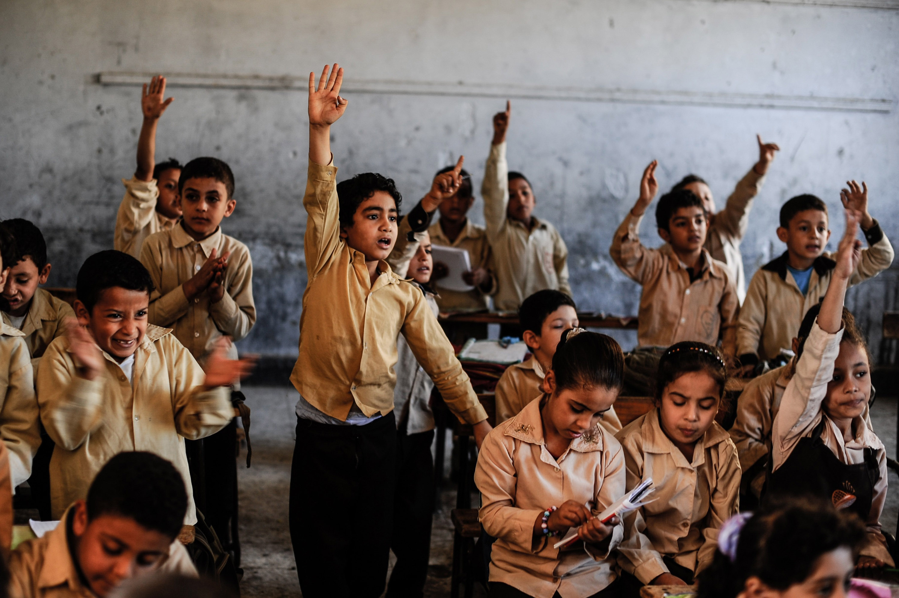Elementary school students in Giza, Egypt, face big class sizes and poor equipment and facilities. (Mohamed Hossam—Anadolu Agency/Getty Images)