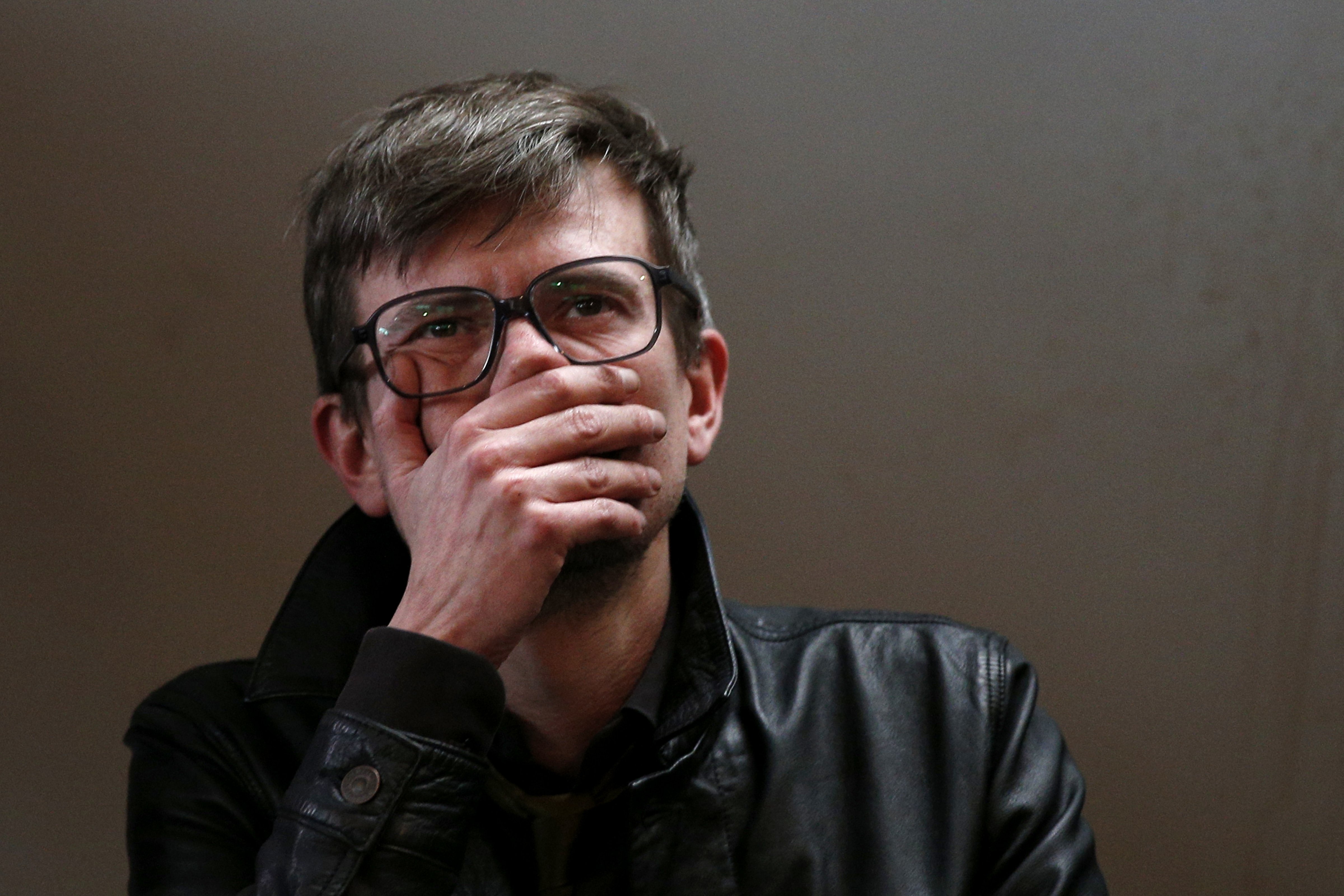 Charlie Hebdo caricaturist Rénald Luzier reacts during a press conference about the next Charlie Hebdo edition in Paris, France, 13 January 2015.