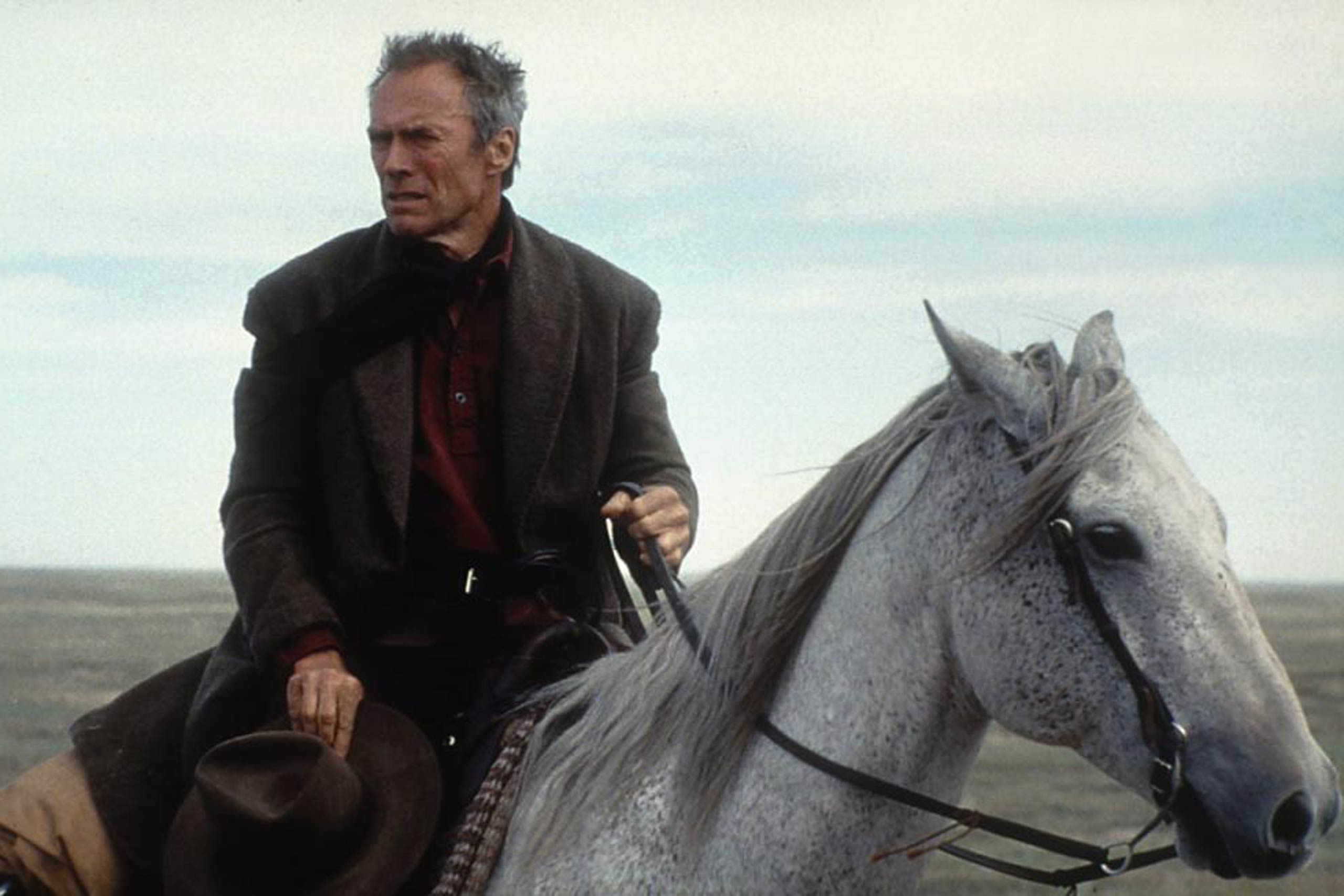 Unforgiven, 1992 Eastwood's first western since Pale Rider in 1985 is a dark, passionate drama with good guys so twisted and bad guys so persuasive that virtue and villainy become two views of the same soul. But it is also Eastwood's meditation on the burdens of age, repute, courage, heroism — on Clintessence. The movie takes its time letting you watch the aging gunfighter, Will Munny, turn into Clint. And when he does, it's not thrilling but scary. At the end he threatens to  come back and kill everyone.  Will says he's doing it all for the money. But it's really because a man's job is his life. Will shoots people. Clint shoots westerns. And for once, the Hollywood establishment took notice, awarding the film Oscars for Best Picture and Best Director (Eastwood) and the renegade star an Oscar nomination as Best Actor. After nearly 40 years in the movie business, these were his first-ever Academy Award citations.