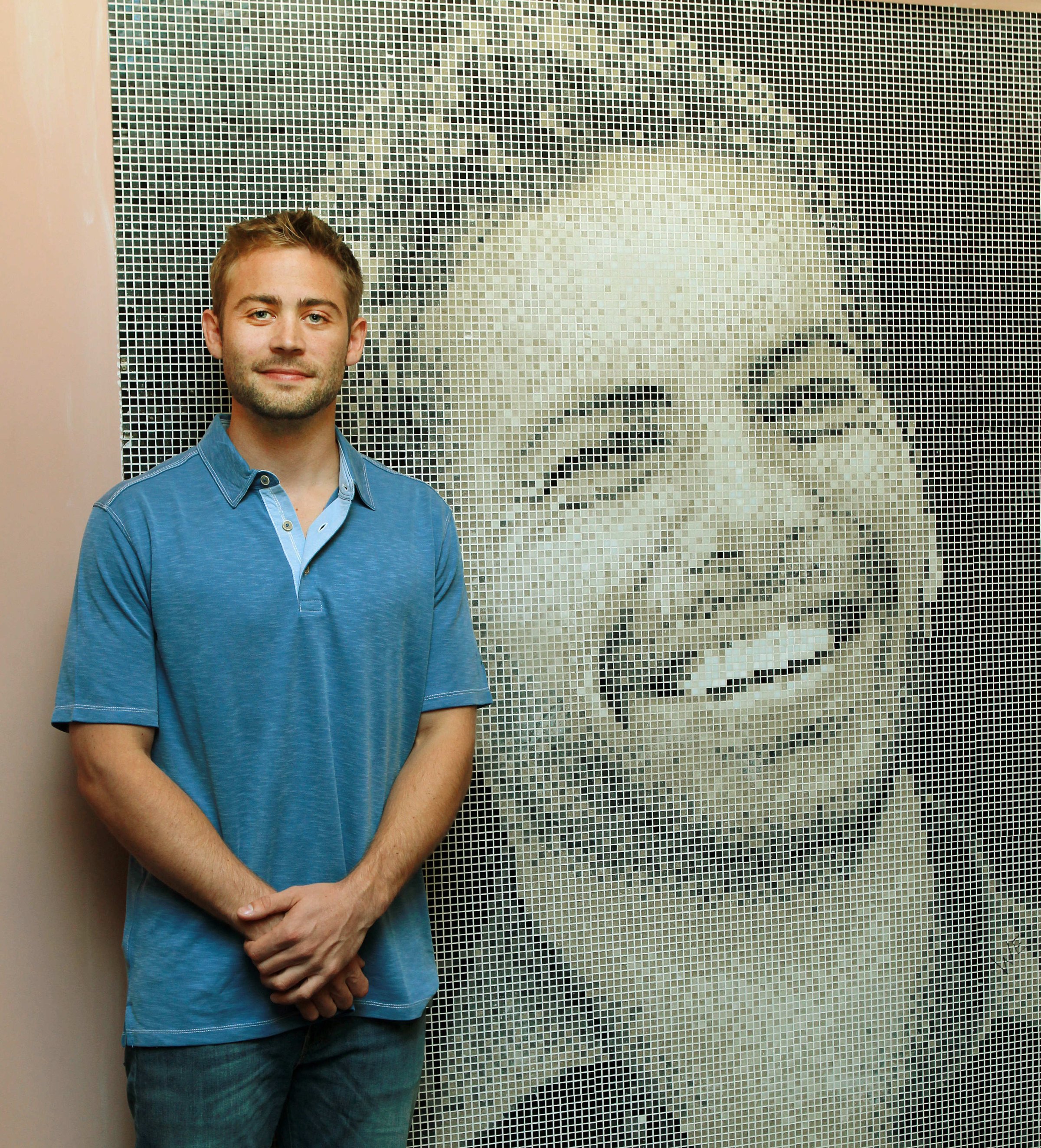 Cody Walker unveils a giant mosaic plaque dedicated to his late brother, American actor Paul Walker, at United Cinemas in Craigieburn, New South Wales
