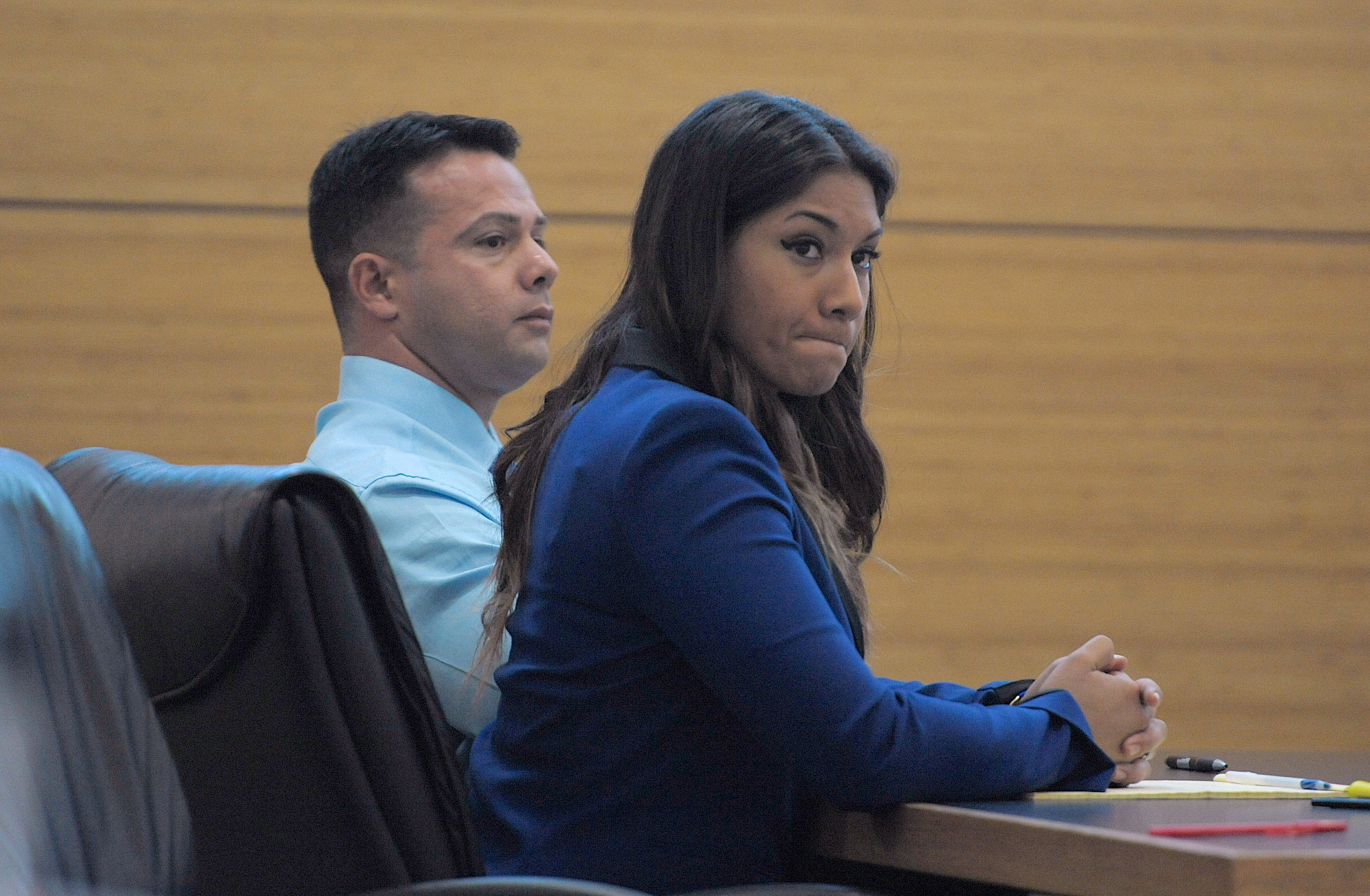 Elissa Alvarez, 20, right, and Jose Caballero, 40, listen to witness testimony during their trial for lewd and lascivious exhibition on May 1, 2015, at the Manatee County Judicial Center in Bradenton. (Paul Videla—Bradenton Herald)