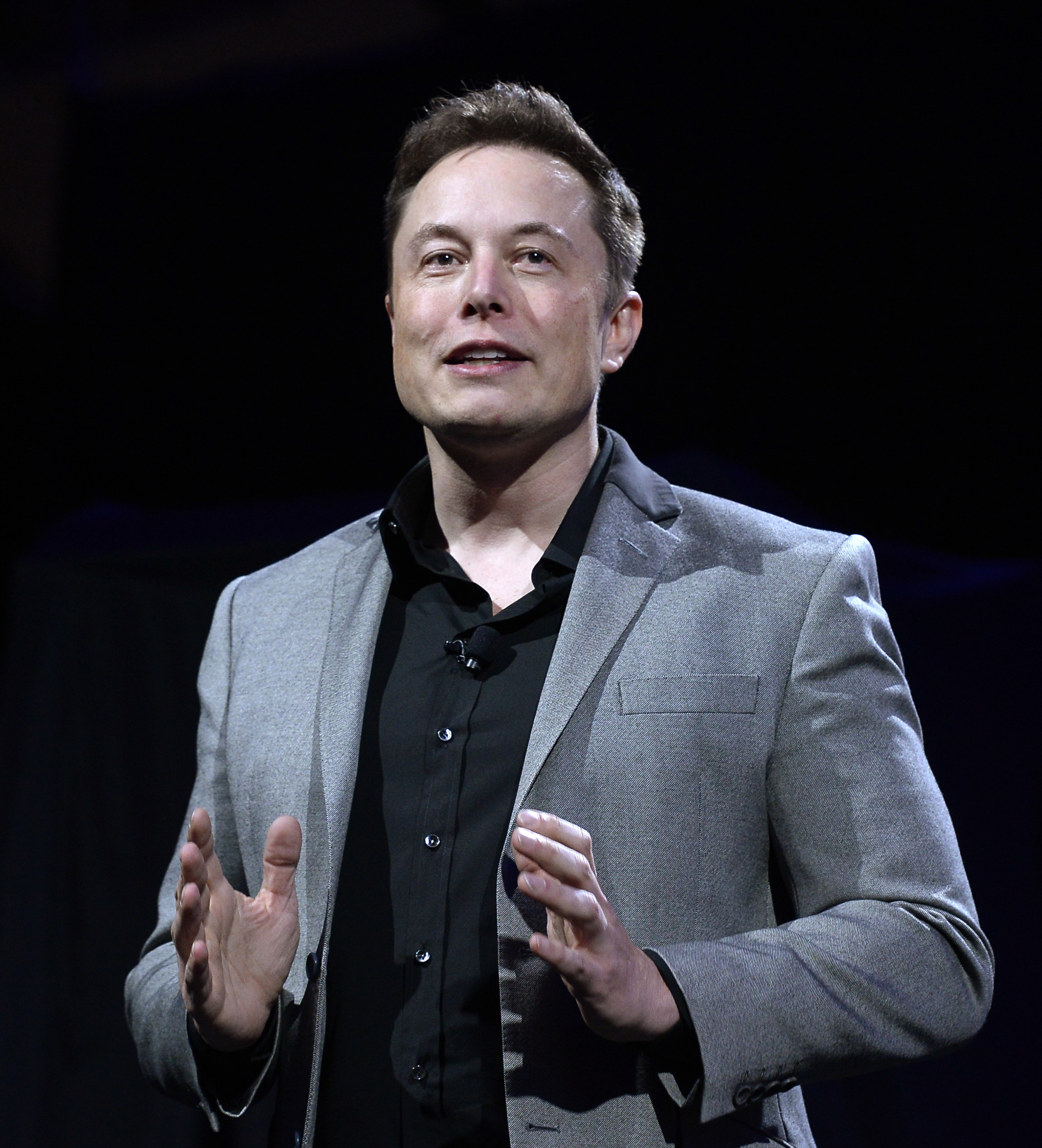 Elon Musk, CEO of Tesla, unveils batteries for homes, businesses, and utilities at Tesla Design Studio April 30, 2015 in Hawthorne, California. (Kevork Djansezian—Getty Images)