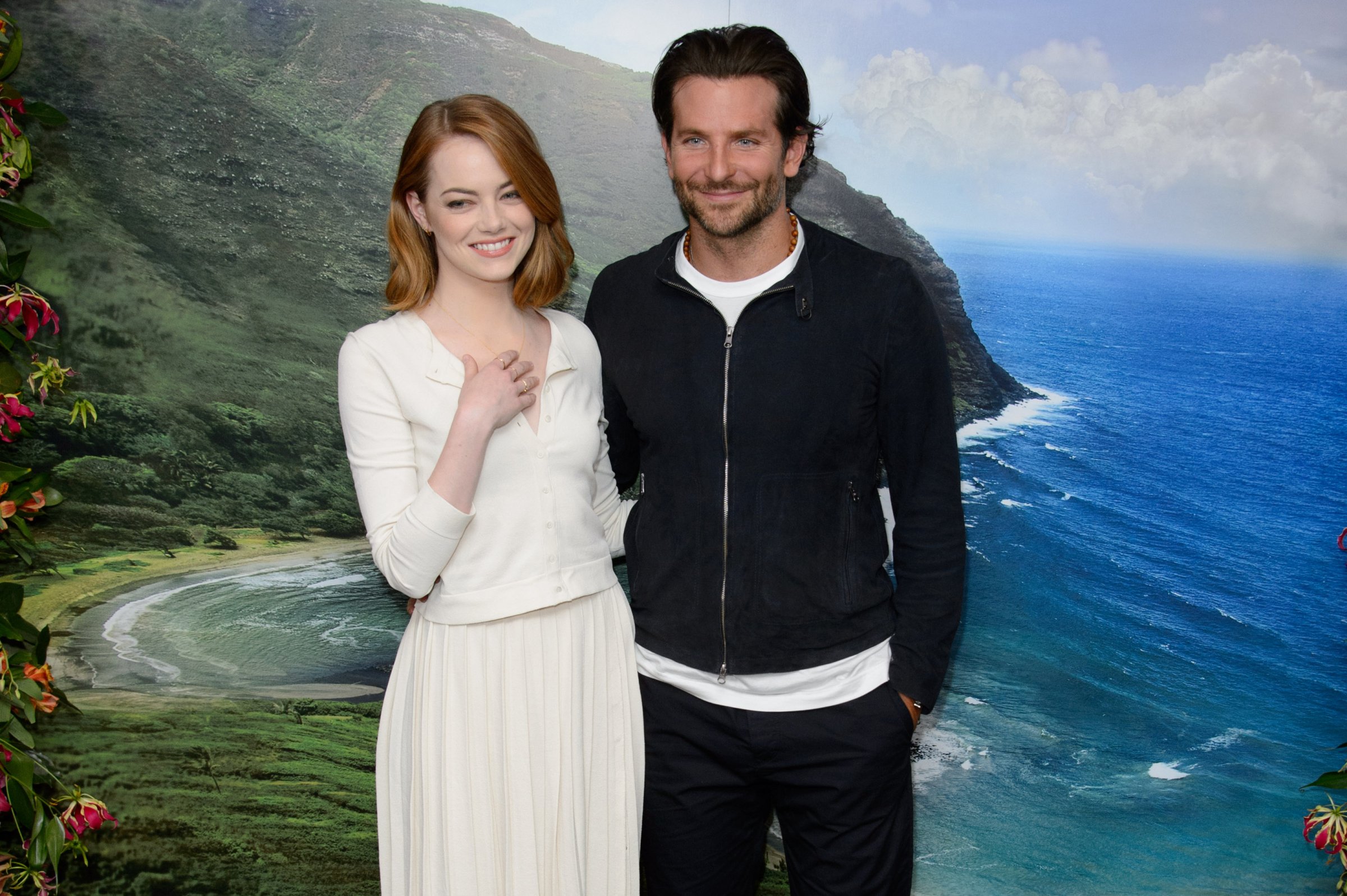 U.S actress Emma Stone and U.S actor Bradley Cooper pose for photographers at a photocall for Aloha at a central London venue