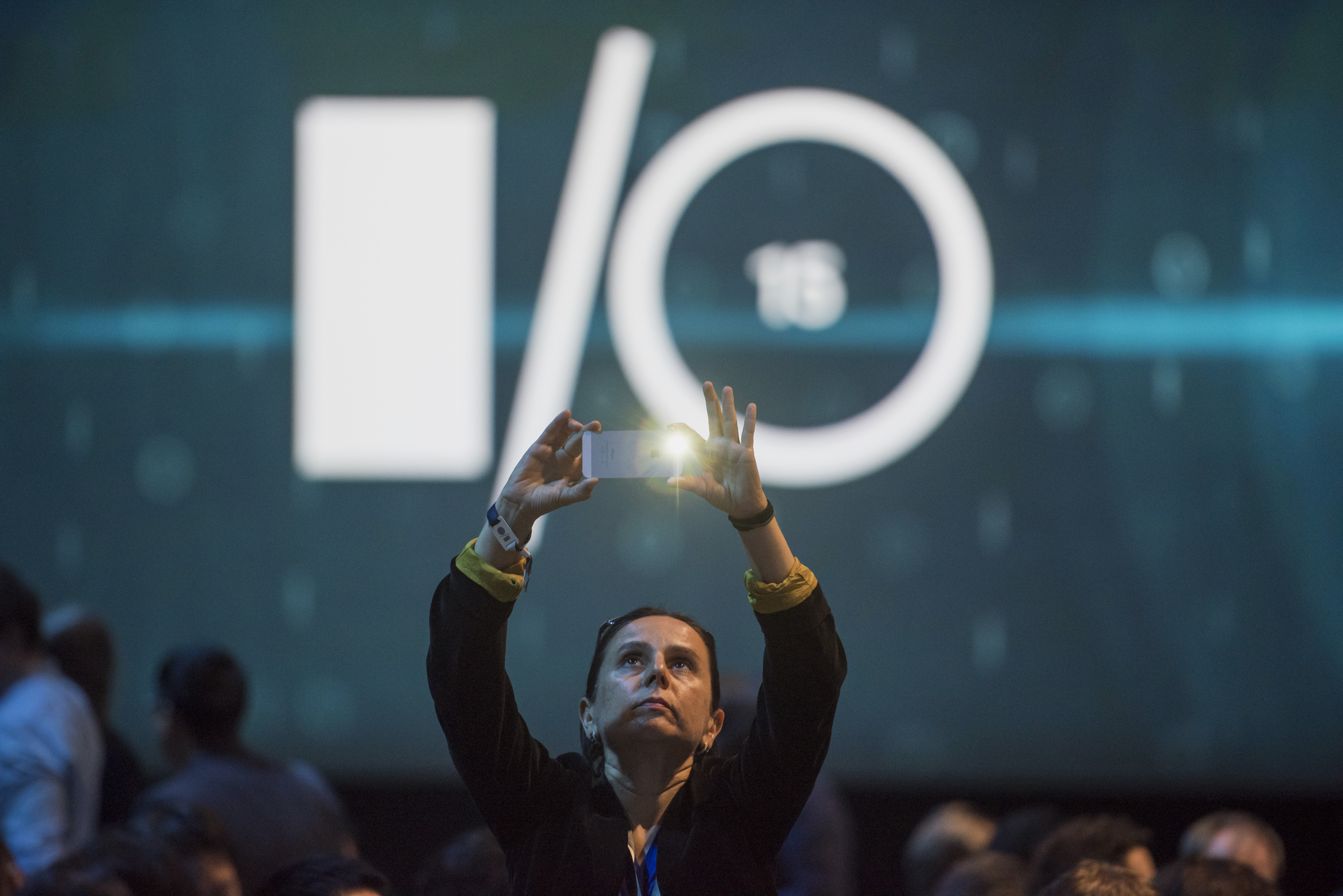 An attendee takes a photograph prior to the Google I/O Annual Developers Conference in San Francisco, California, U.S., on Thursday, May 28, 2014. (David Paul Morris—© 2015 Bloomberg Finance LP)