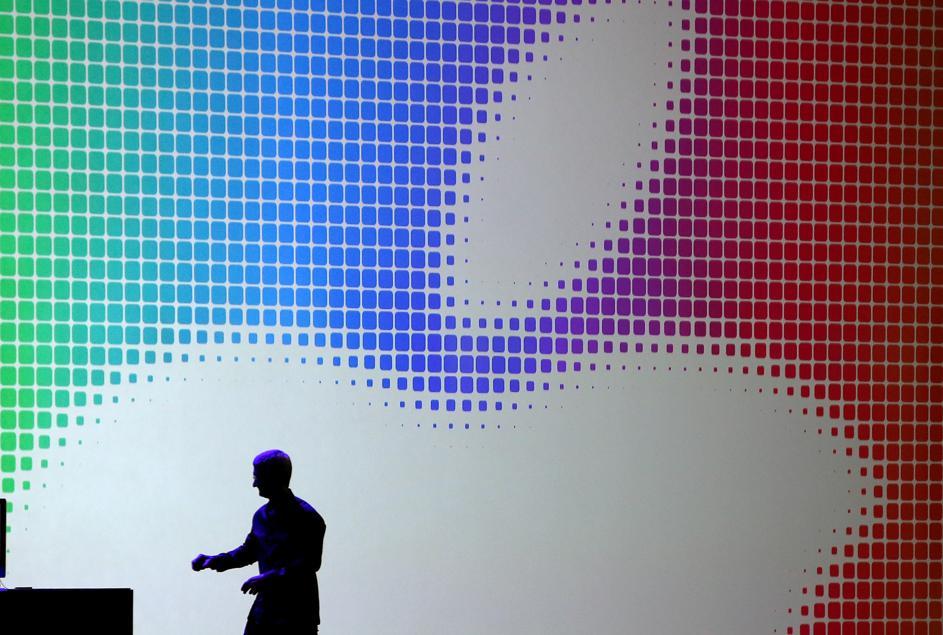Apple CEO Tim Cook walks off stage after speaking during the Apple Worldwide Developers Conference at the Moscone West center on June 2, 2014 in San Francisco, California. (Justin Sullivan&mdash;Getty Images)