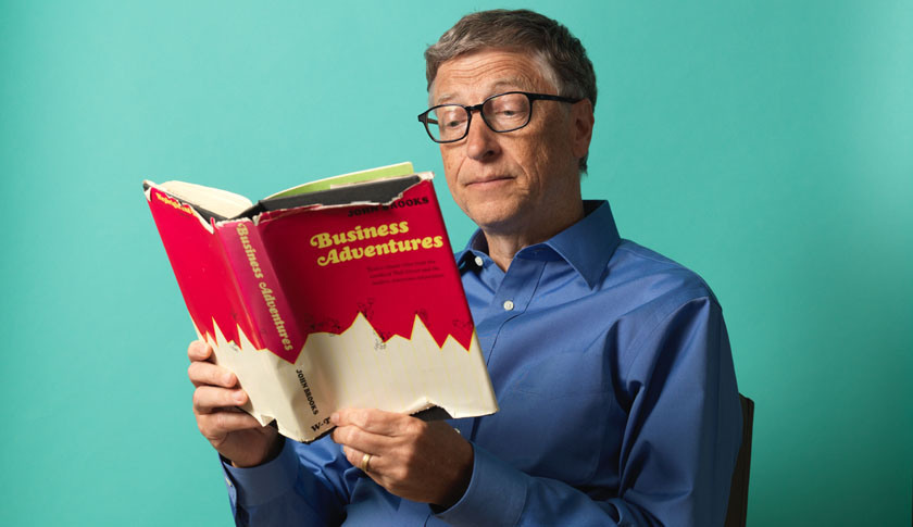Founder and Chairman of Microsoft Bill Gates holding a copy of Business Adventures by John Brooks. (John Keatley/Redux&mdash;John Keatley/Redux)