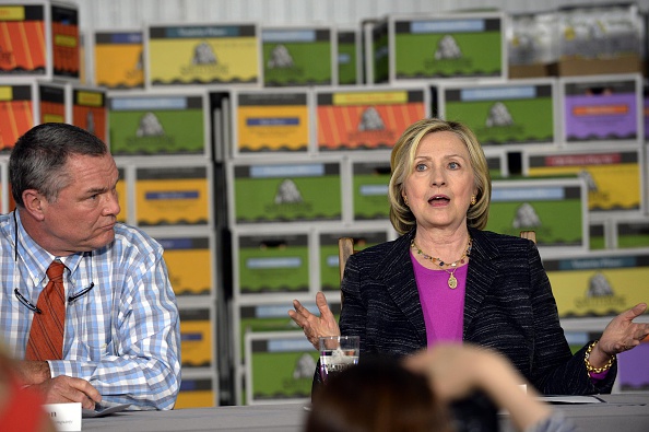 Democratic presidential candidate Hillary Clinton speaks at a business roundtable at the Smuttynose Brewery with co-owner Peter Egelston May 22, 2015 in Hampton, New Hampshire.