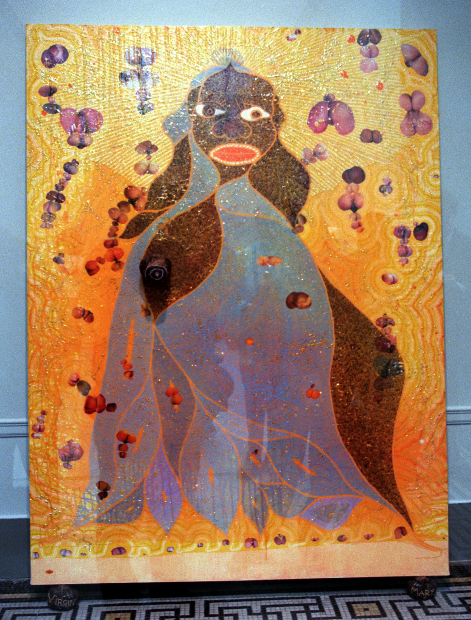 Artist Chris Ofili's controversial work "The Holy Virgin Mary" is seen in the Brooklyn Museum of Art as part of the Sensation exhibit in New York 30 September 1999. (Doug Kanter&amp;mdash;AFP/Getty Images)