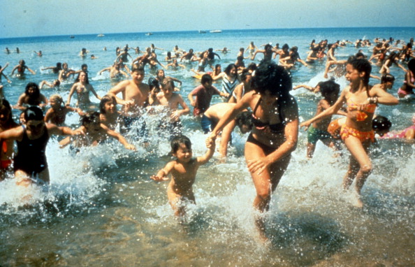 Crowds run out of the water in a scene from the film 'Jaws', 1975. (Universal Pictures—Getty Images)