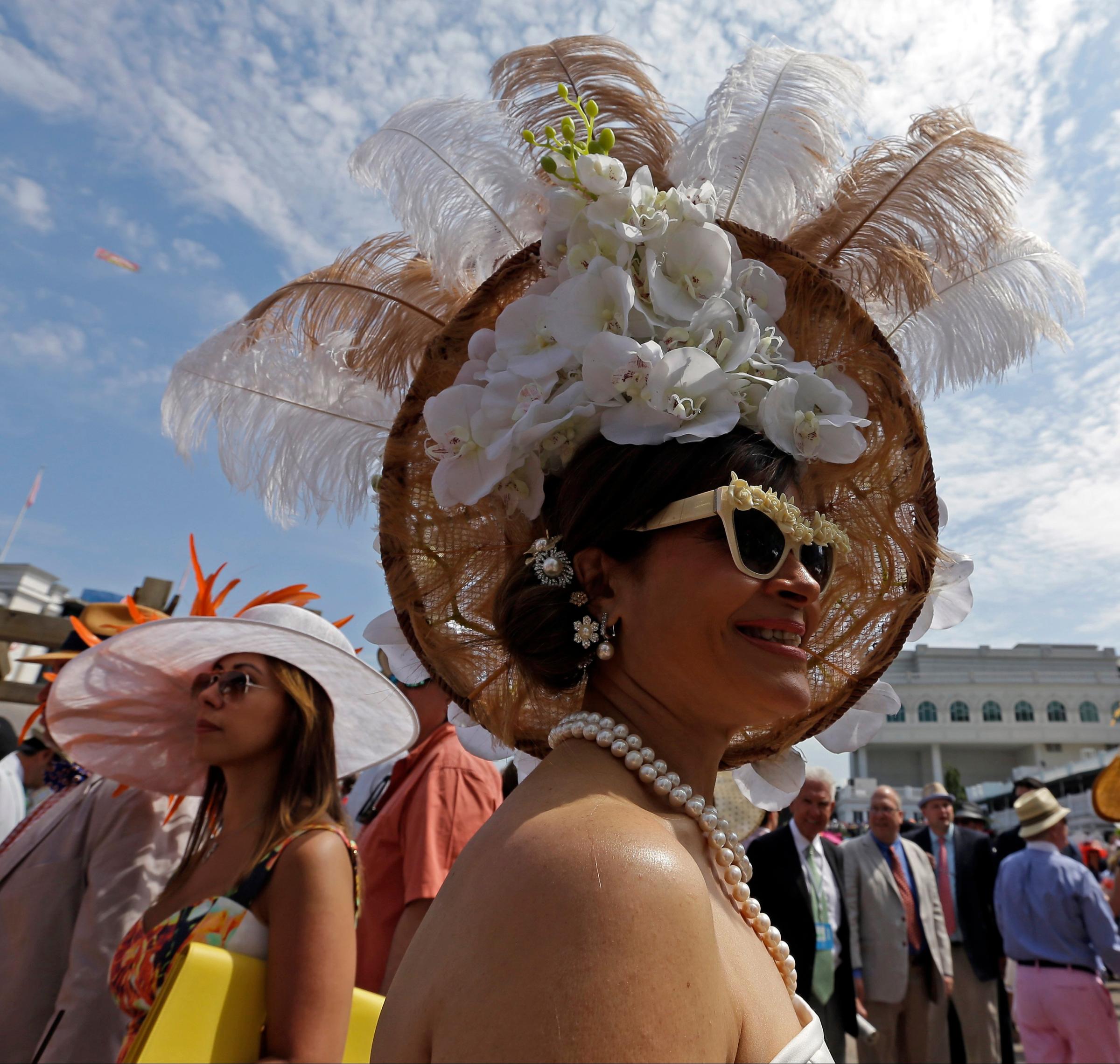 Woman with a hat during the 141st running of the Kentucky Oaks horse race at Churchill Downs on May 2, 2015, in Louisville, Ky.