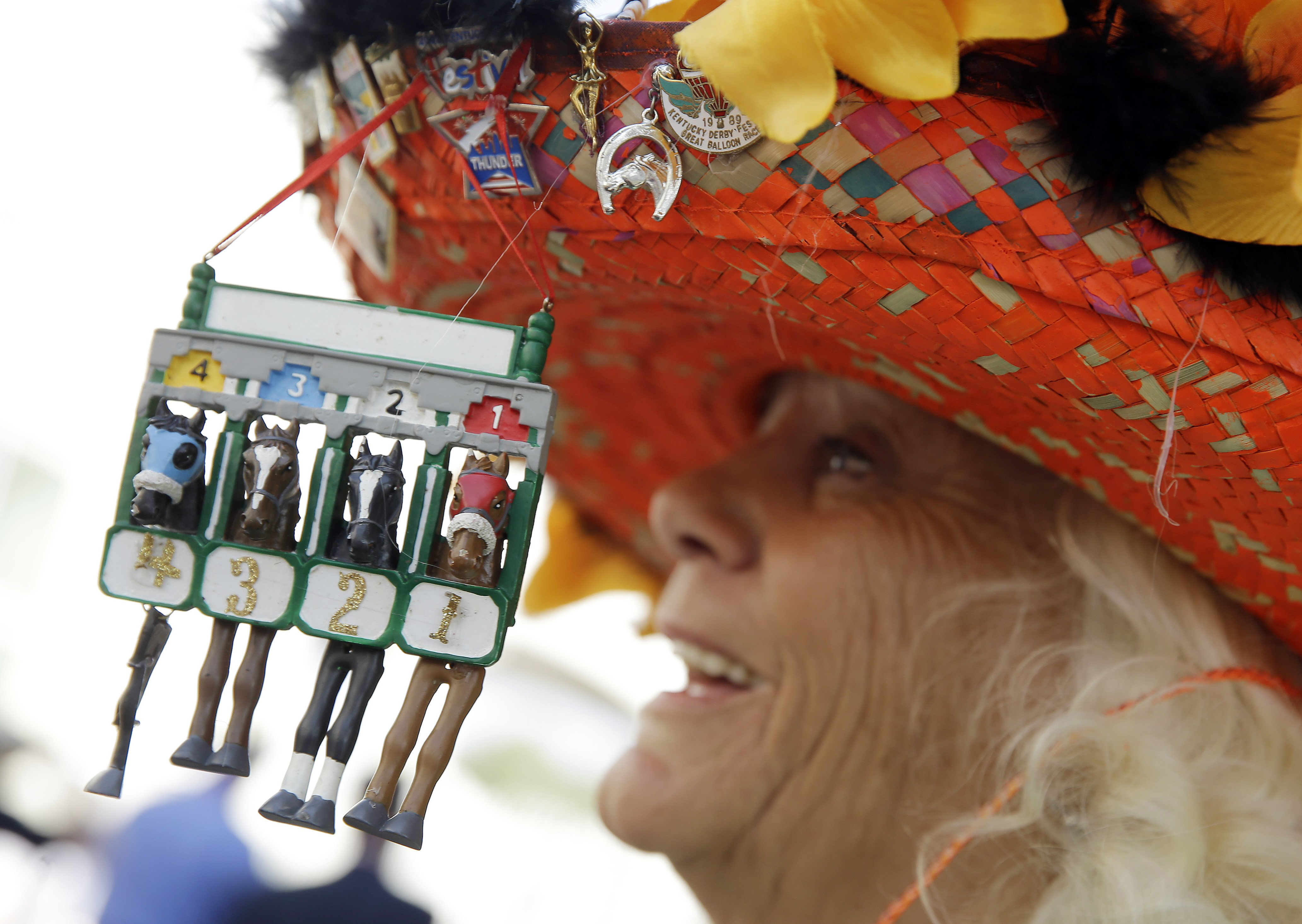 Woman with a hat during the 141st running of the Kentucky Oaks horse race at Churchill Downs on May 1, 2015, in Louisville, Ky.