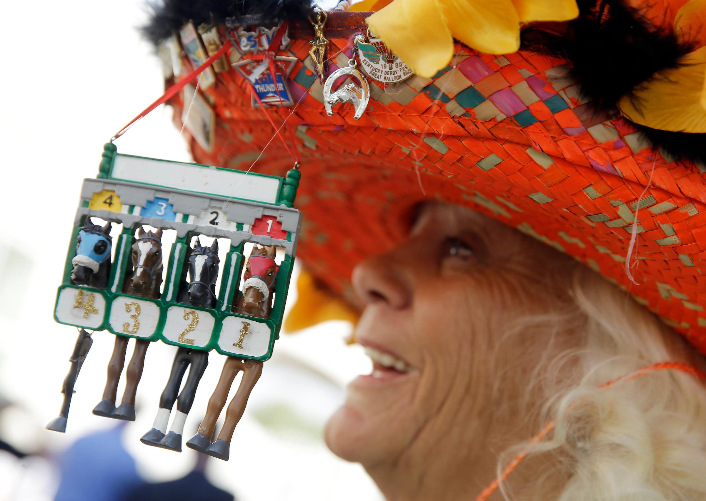 Woman with a hat during the 141st running of the Kentucky Oaks horse race at Churchill Downs on May 1, 2015, in Louisville, Ky.