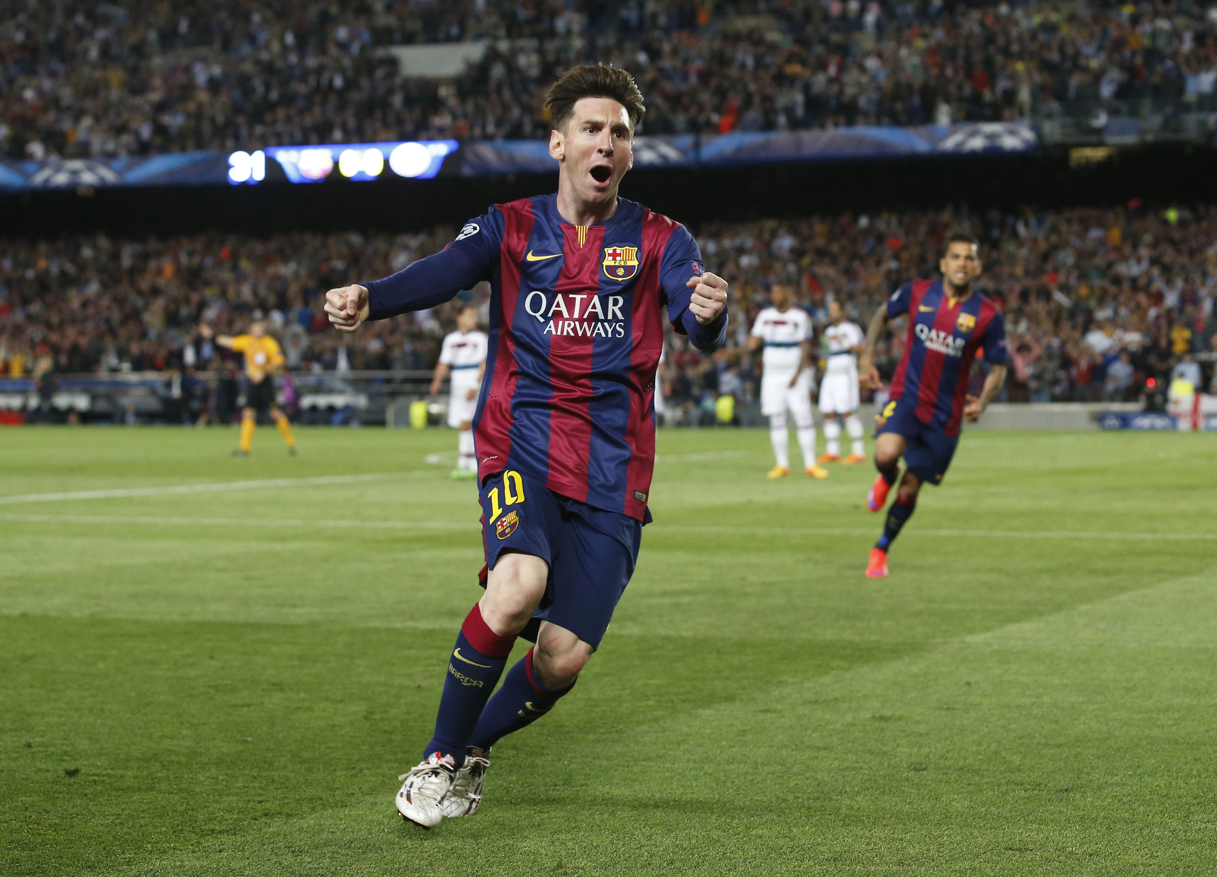 Barcelona's Lionel Messi celebrates his first goal  against Bayern Munich in the UEFA Champions League Semi Final First Leg at The Nou Camp in Barcelona on May 5, 2015.