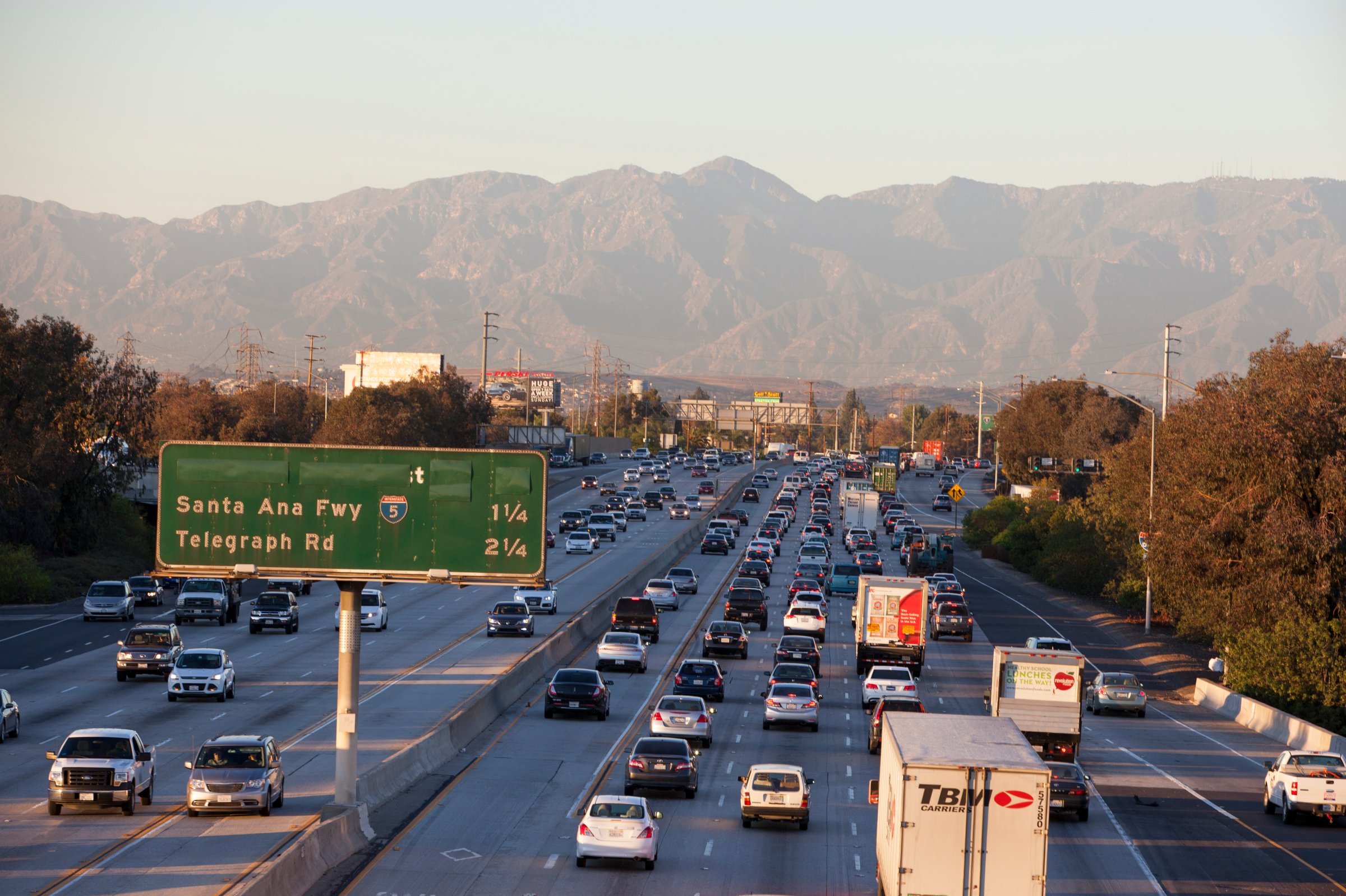 The 605 freeway is jammed with cars on a day when the mountains are visible in the distance, on November 5, 2014 in Los Angeles, California.