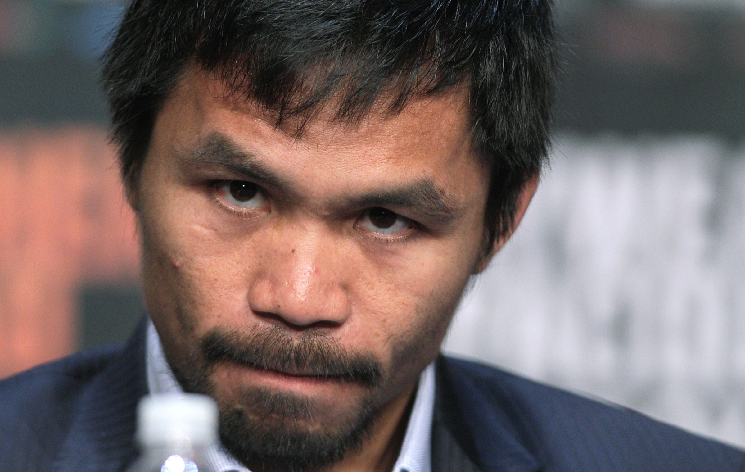 WBO welterweight champion Manny Pacquiao listens during a news conference at the KA Theatre at MGM Grand Hotel & Casino in Las Vegas, April 29, 2015.