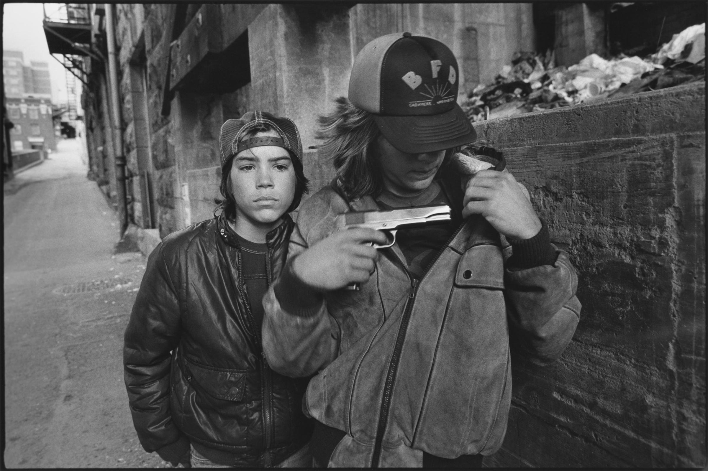 "Rat" and Mike with a gun, Seattle, Washington, 1983