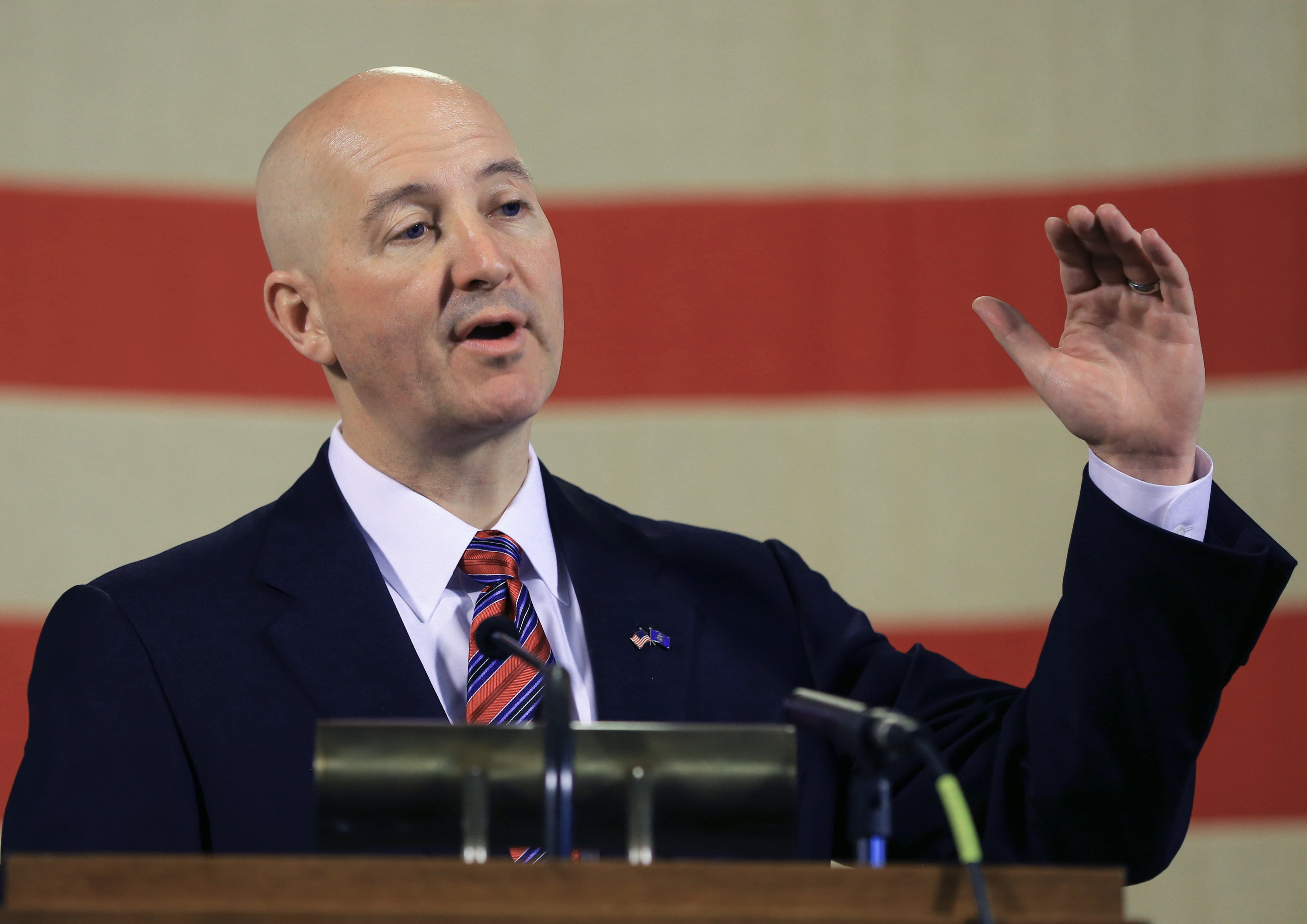 Neb. Gov. Pete Ricketts gestures during a news conference in Lincoln, Neb. on May 20, 2015. (Nati Harnik—AP)