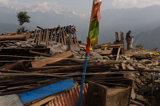 Nepal earthquake. Barpak, the epicenter of the earthquake. Inhabitants salvaging building materials and possessions from their destroyed houses. by James Nachtwey
