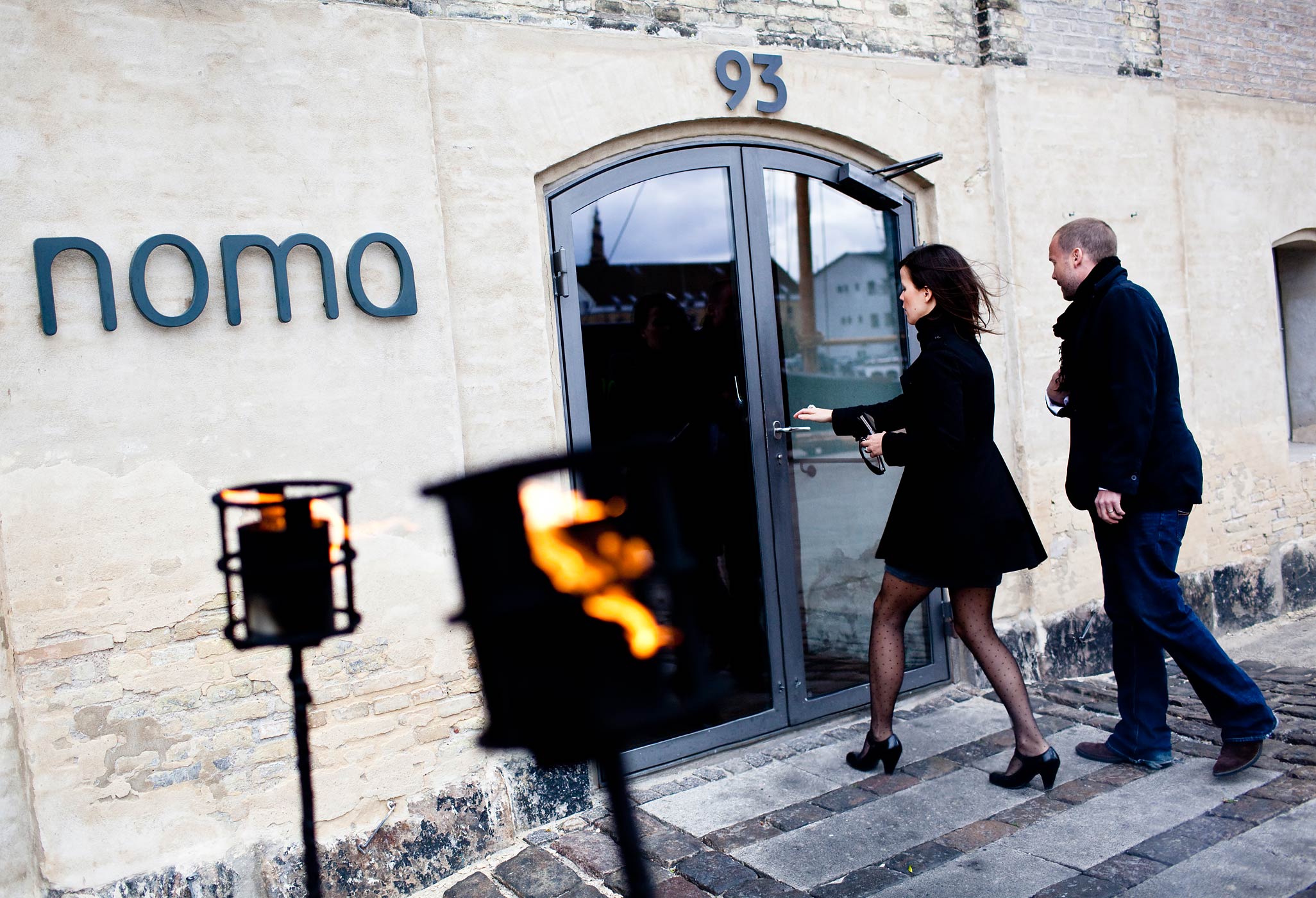 People enter the Noma restaurant in Cope